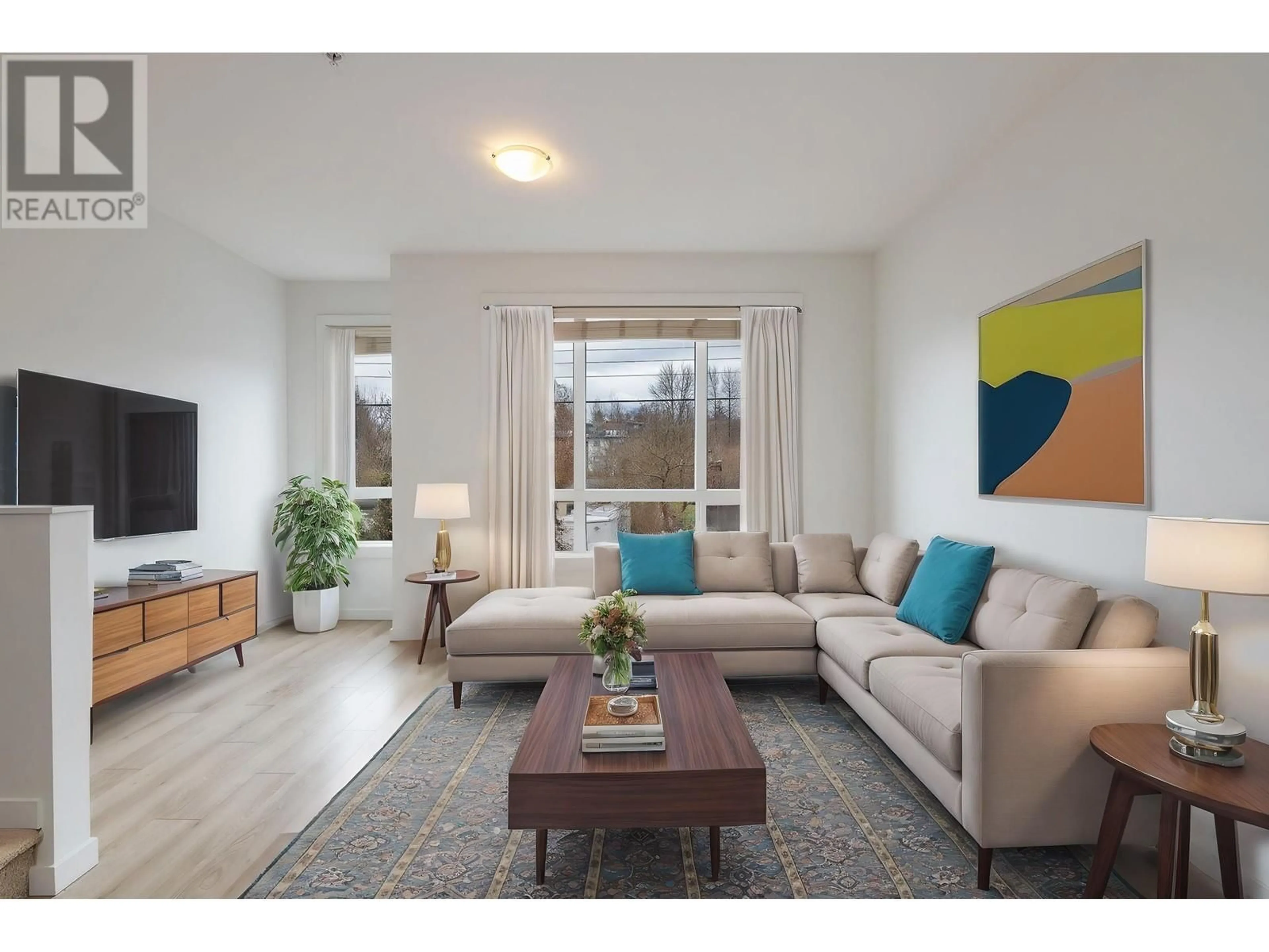 Living room with furniture, wood/laminate floor for 2 1188 WILSON CRESCENT, Squamish British Columbia V8B0A9