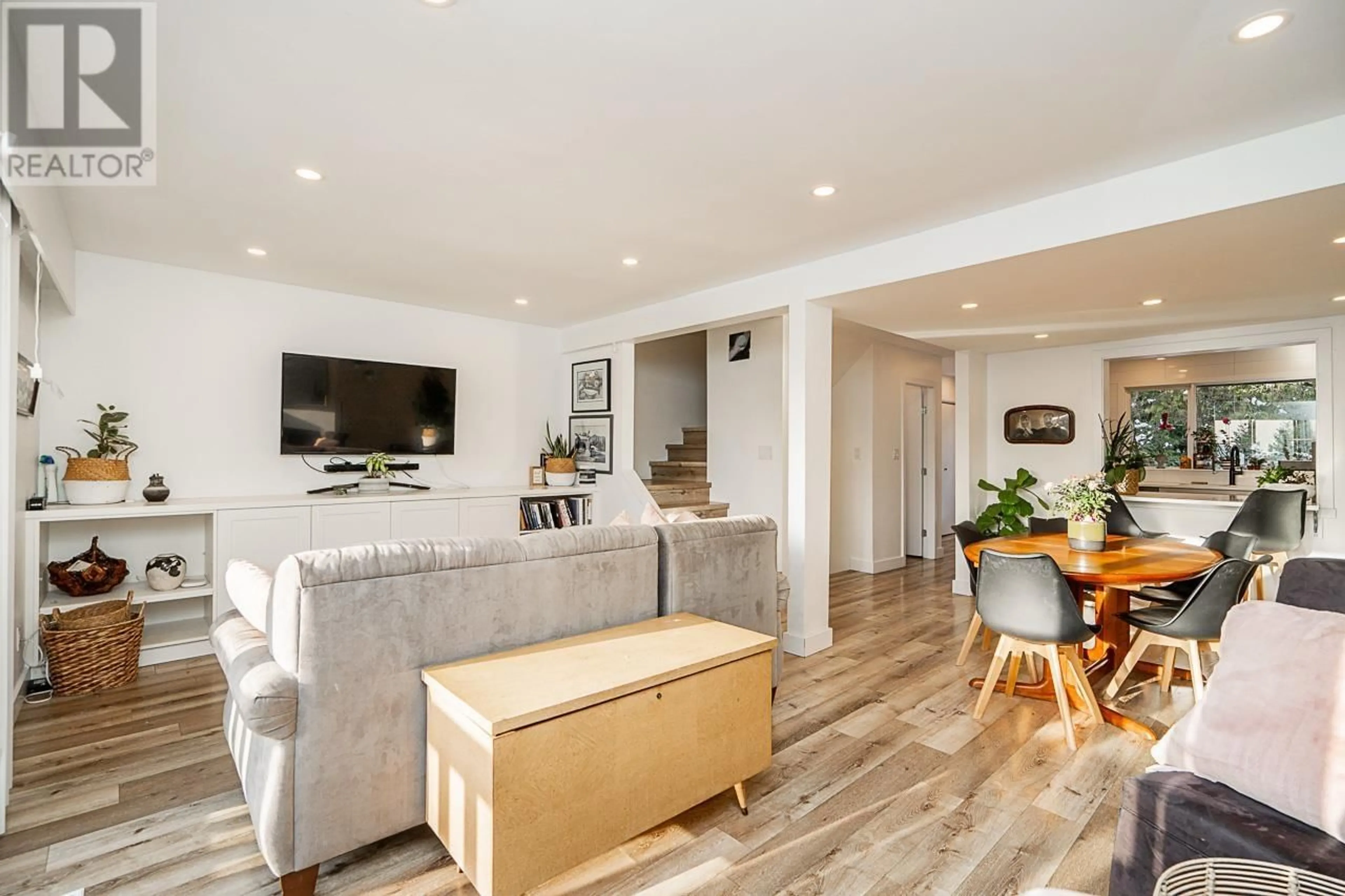 Living room with furniture, wood/laminate floor for 1014 LILLOOET ROAD, North Vancouver British Columbia V7J2H8