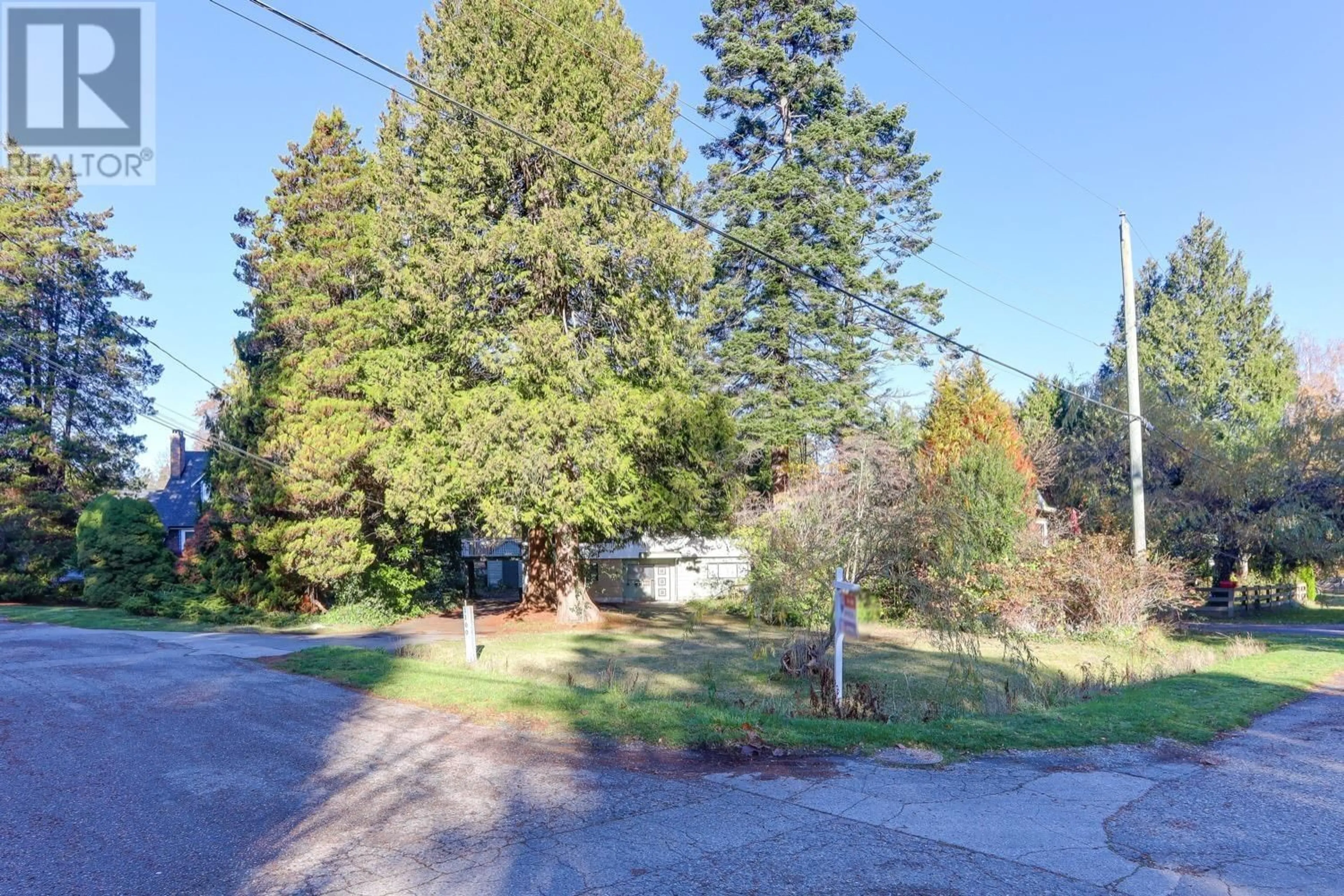A pic from outside/outdoor area/front of a property/back of a property/a pic from drone, forest/trees view for 1100 WILMINGTON DRIVE, Delta British Columbia V4M2S4