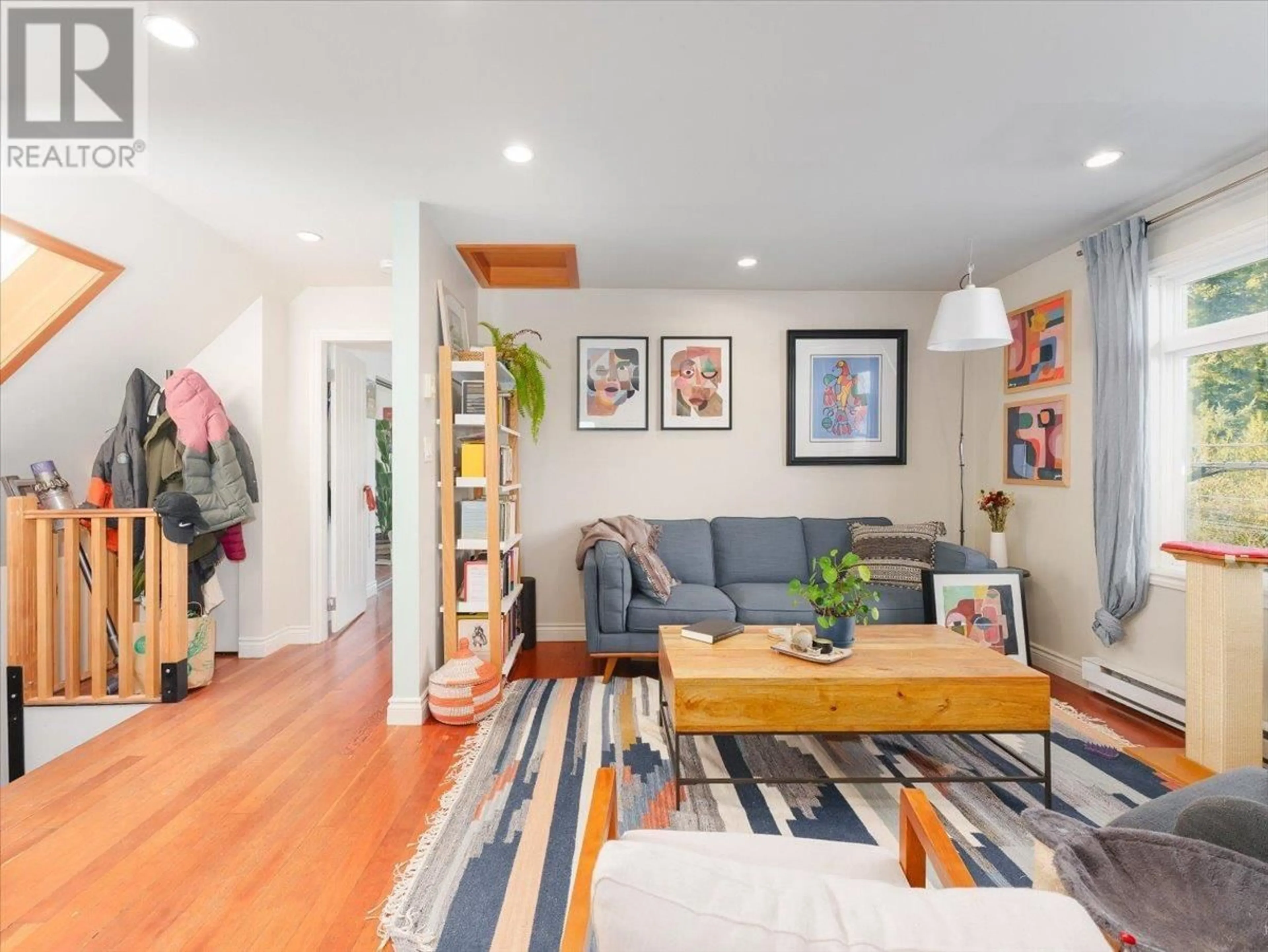 Living room with furniture, wood/laminate floor for 2636 PRINCE ALBERT STREET, Vancouver British Columbia V5T3X3