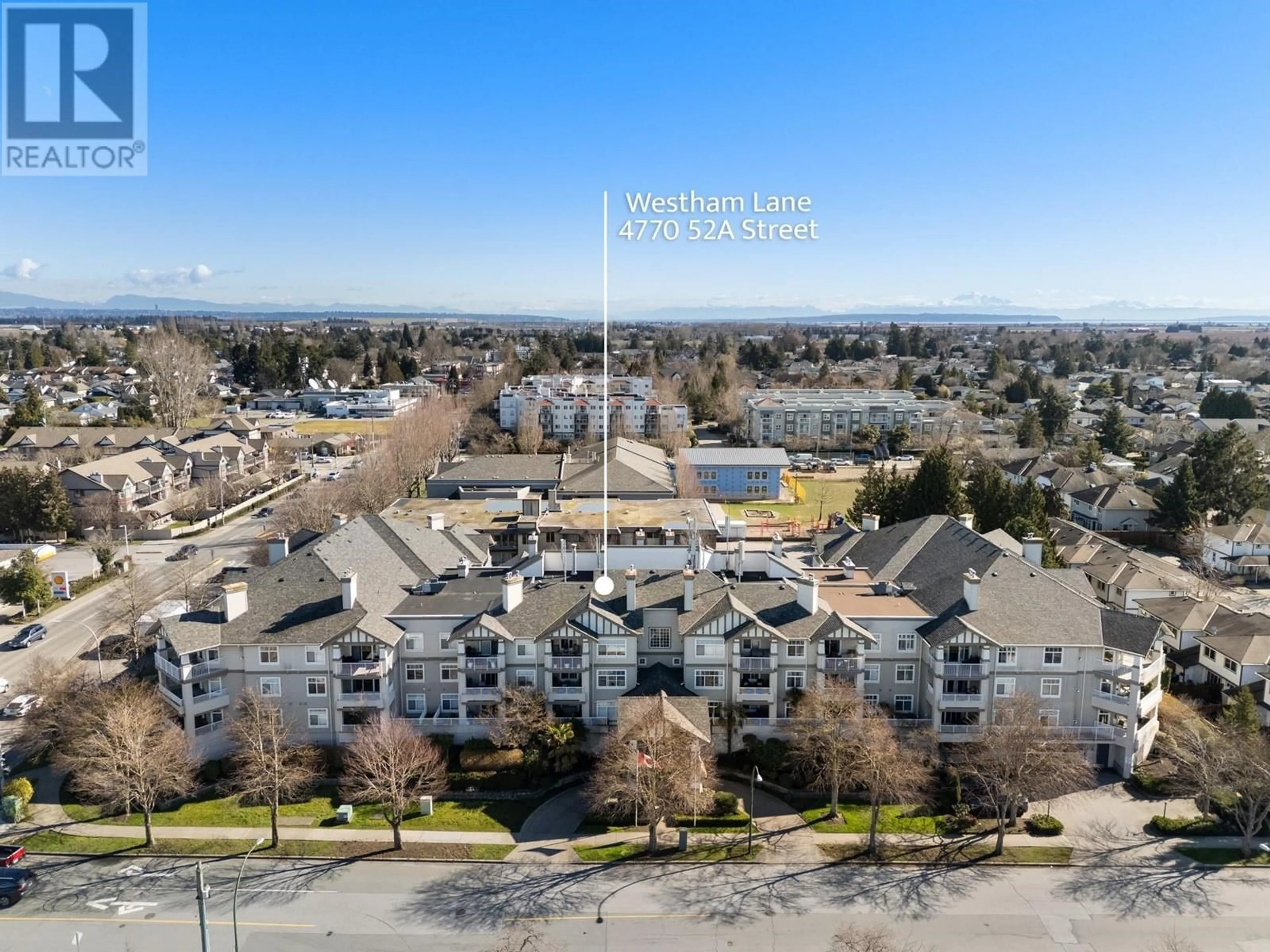 A pic from outside/outdoor area/front of a property/back of a property/a pic from drone, mountain view for 203 4770 52A STREET, Ladner British Columbia V4K5B5