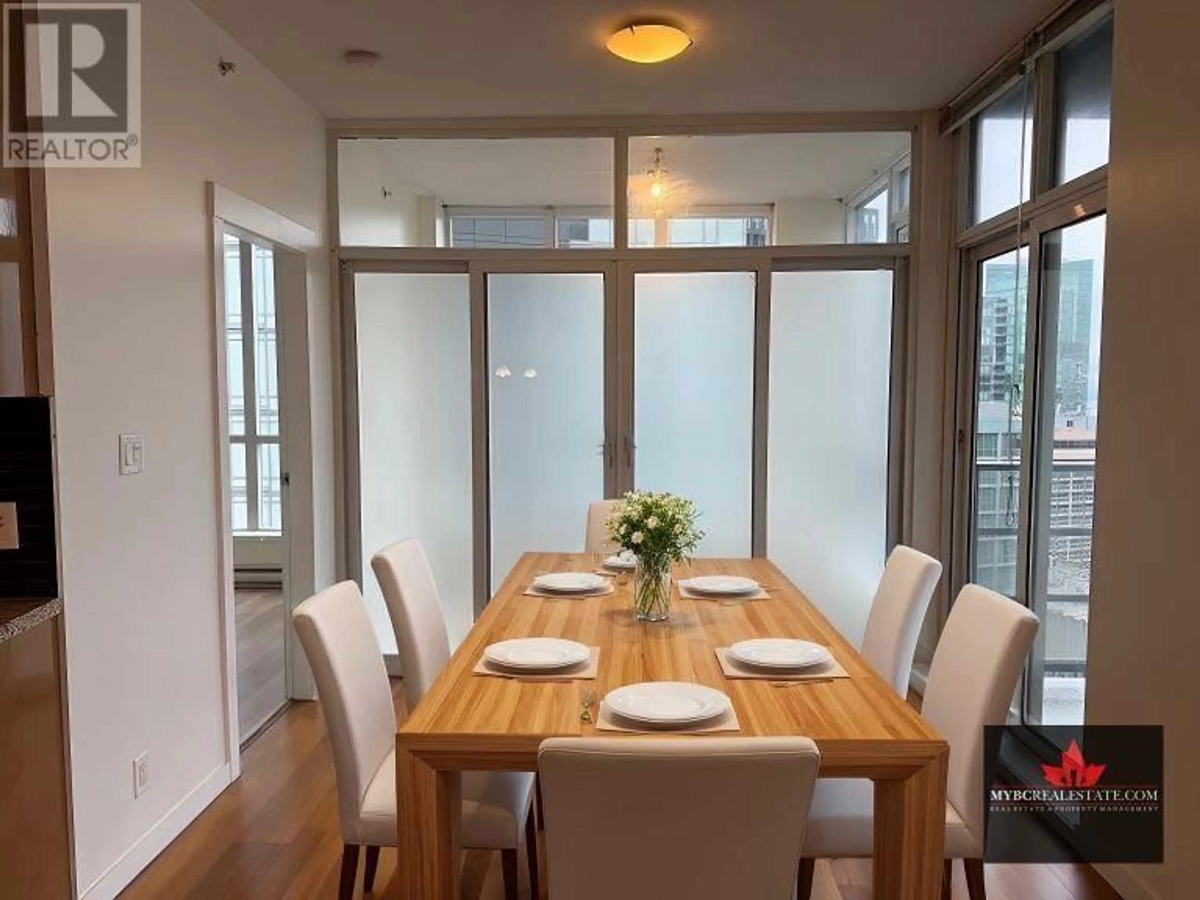 Dining room, wood/laminate floor for 2303 1189 MELVILLE STREET, Vancouver British Columbia V6E4T8