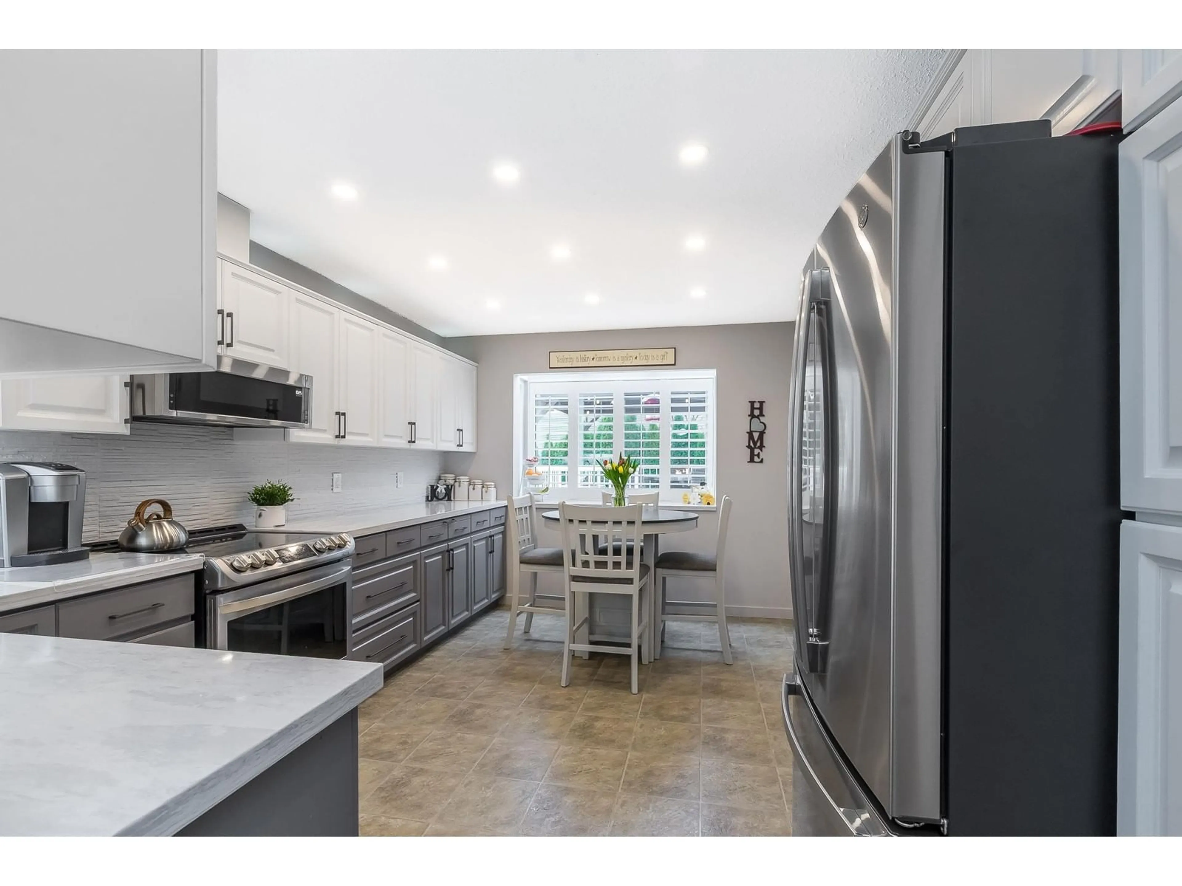 Open concept kitchen, ceramic/tile floor for 5887 184B STREET, Surrey British Columbia V3S5S9