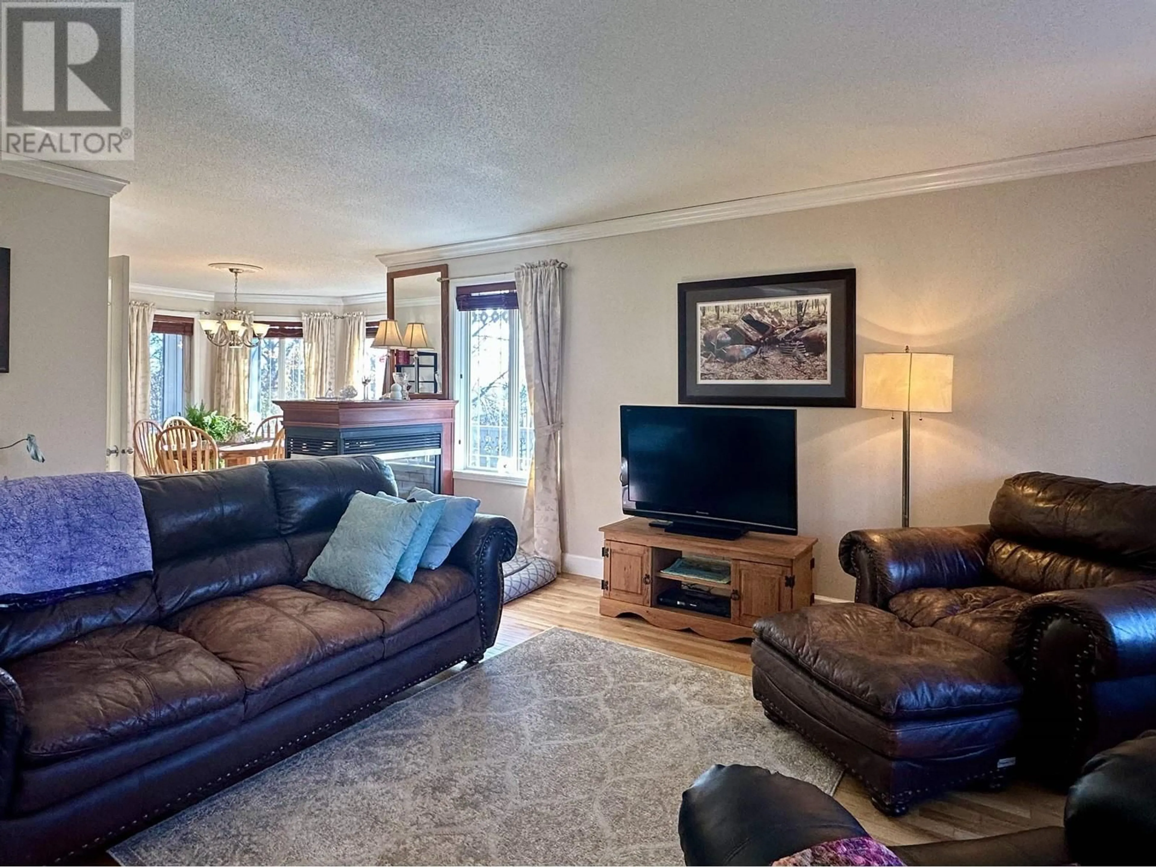 Living room with furniture, unknown for 5308 51 STREET, Fort Nelson British Columbia V0C1R0