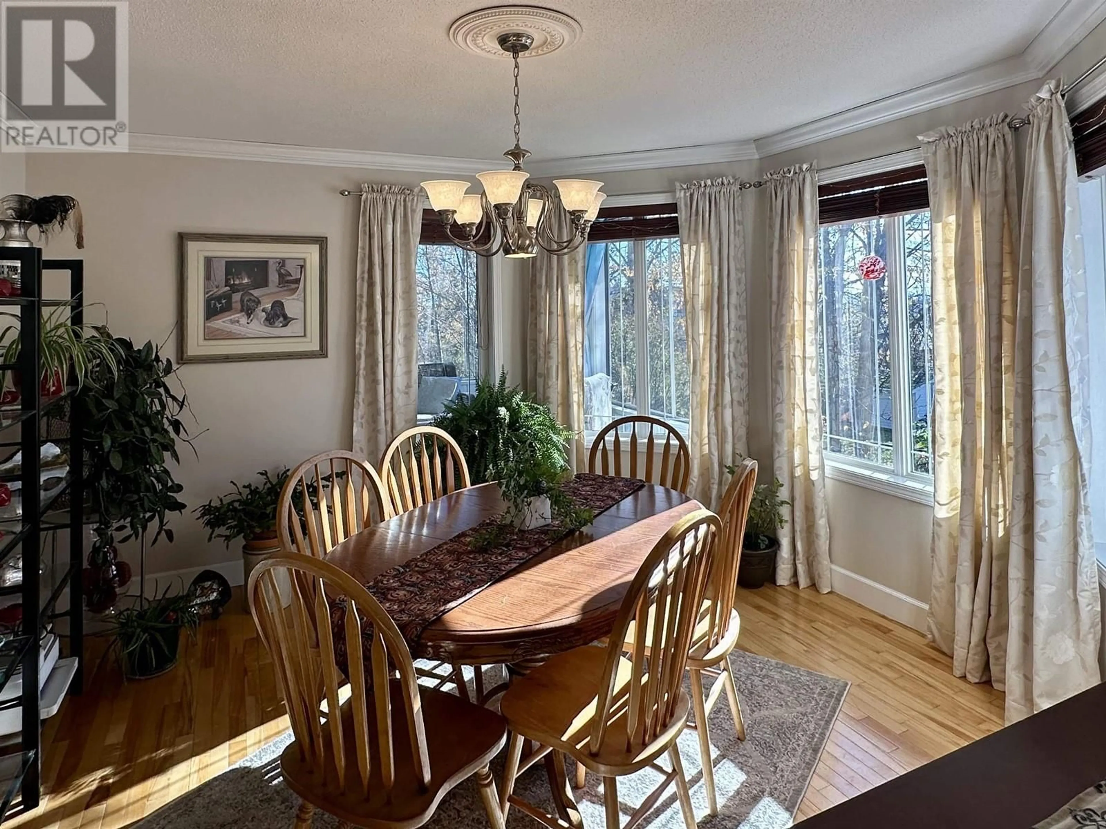 Dining room, wood/laminate floor for 5308 51 STREET, Fort Nelson British Columbia V0C1R0