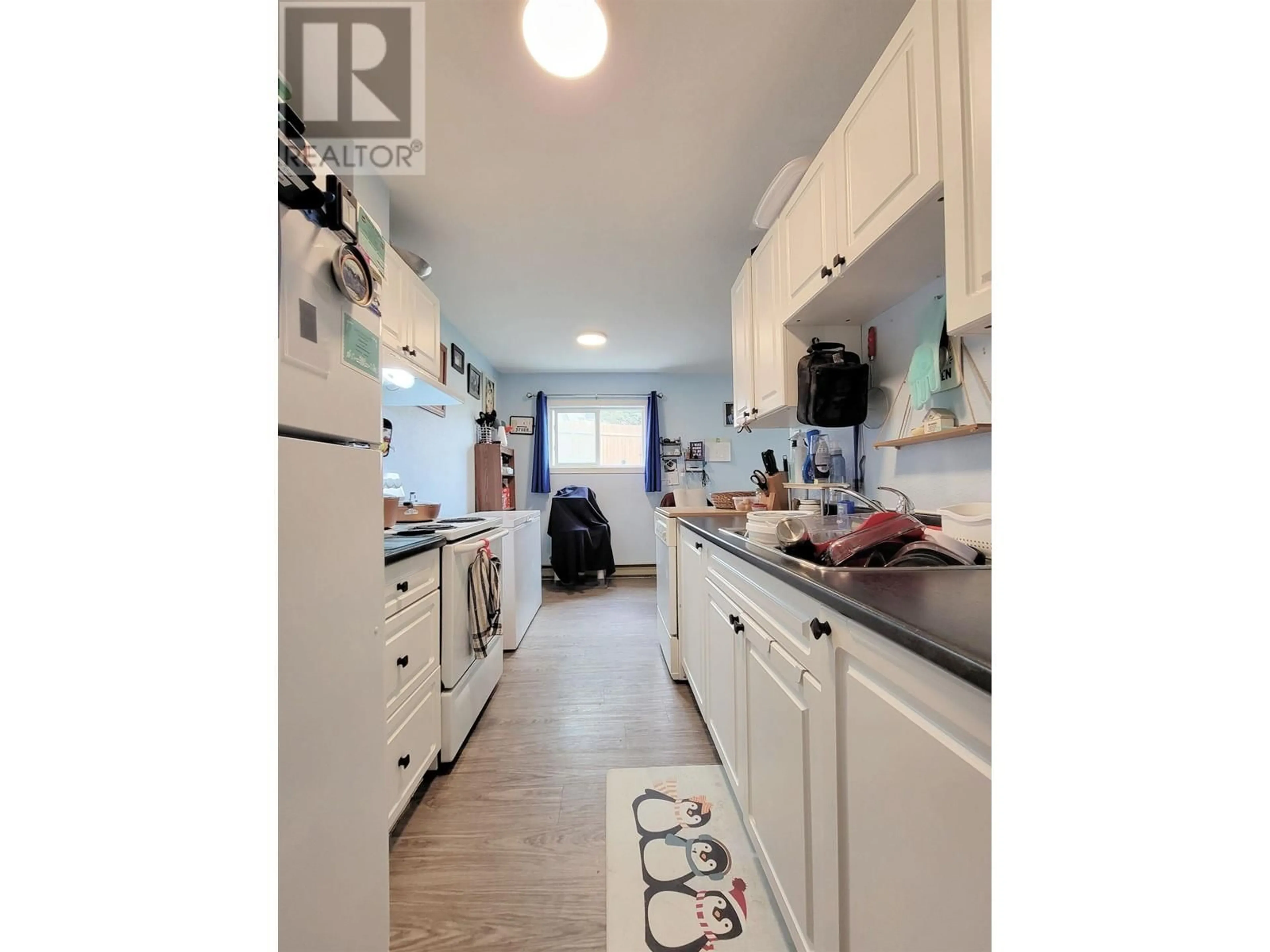 Standard kitchen, wood/laminate floor for 109 - 398 RODDIS DRIVE, Quesnel British Columbia V2J1A6