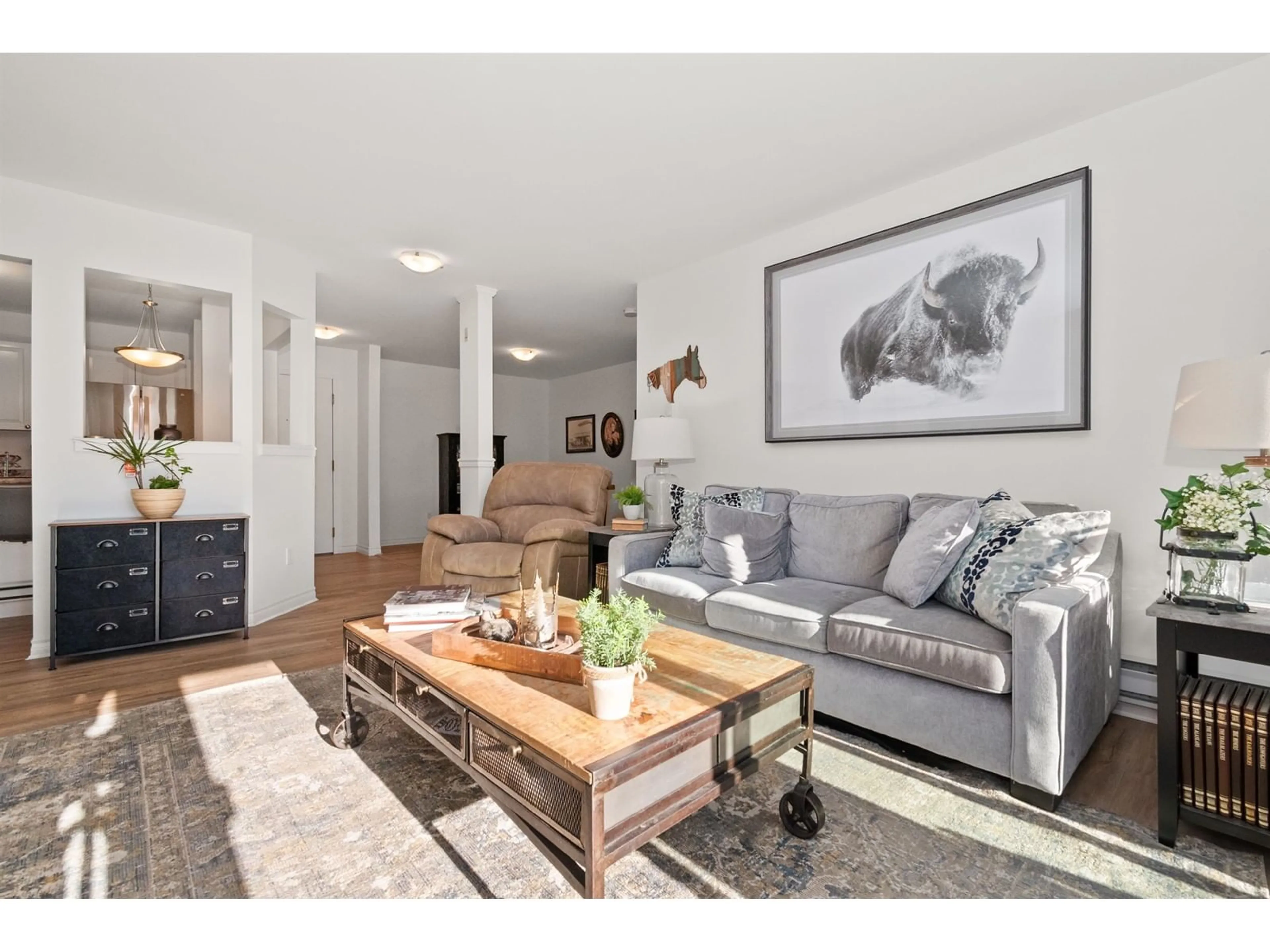 Living room with furniture, wood/laminate floor for 104 - 7651 AMBER DRIVE, Chilliwack British Columbia V2R3J6