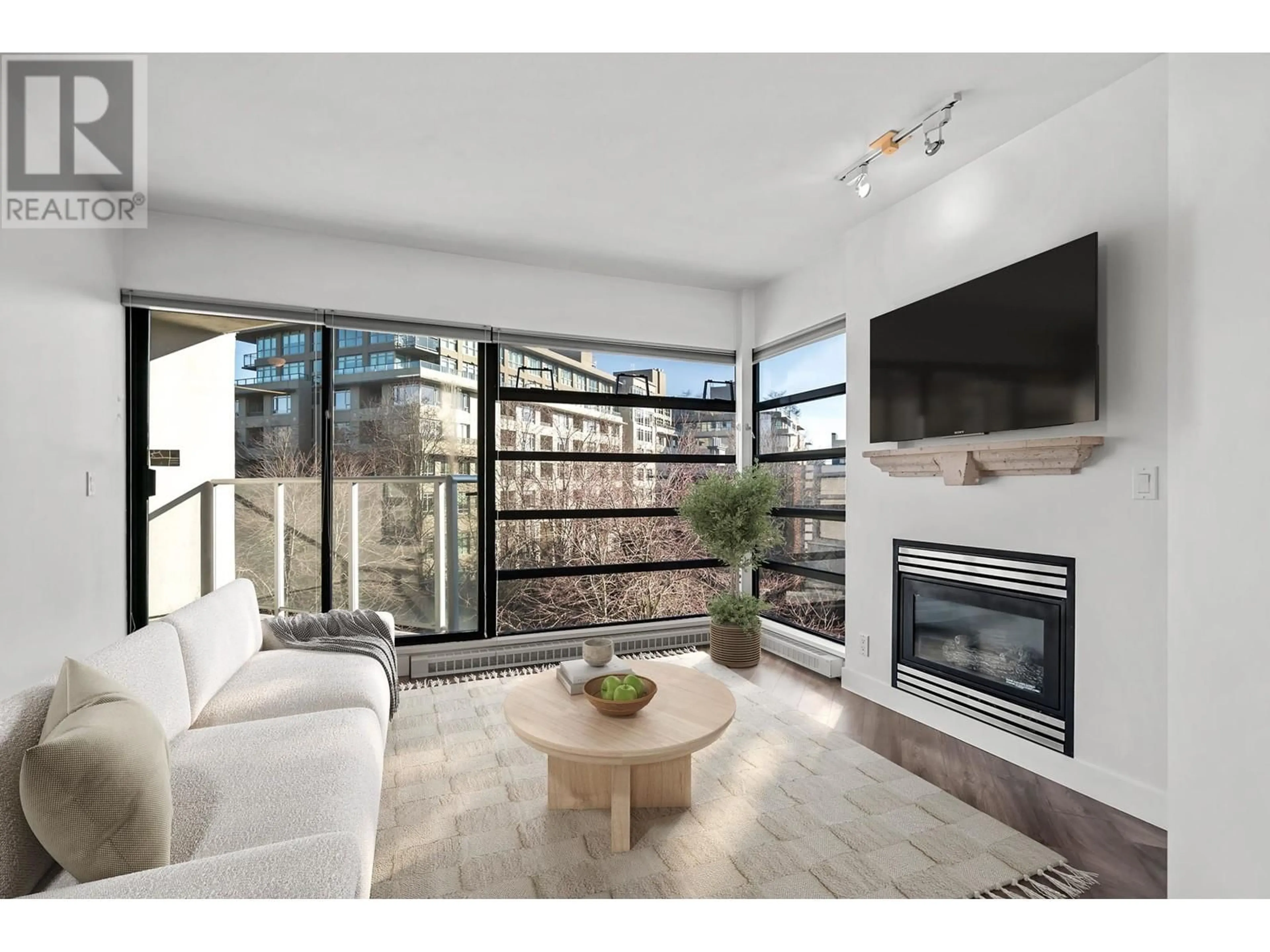 Living room with furniture, ceramic/tile floor for 404 2228 MARSTRAND AVENUE, Vancouver British Columbia V6K4T1