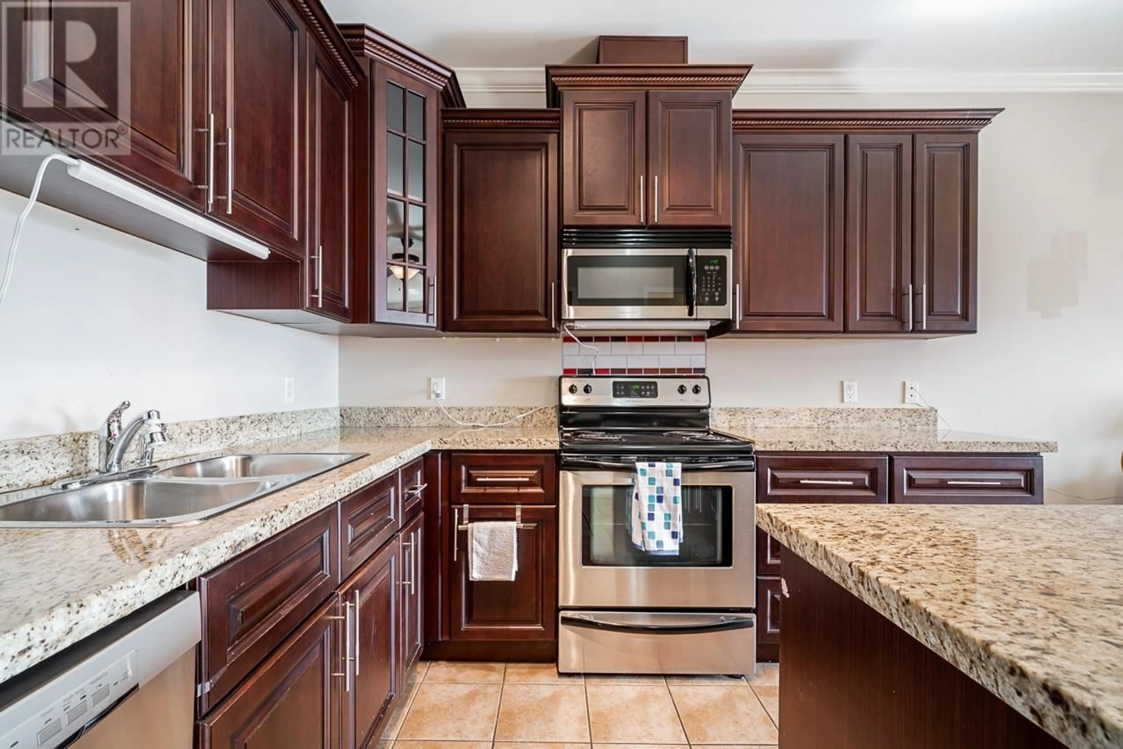 Standard kitchen, ceramic/tile floor for 408 22363 SELKIRK AVENUE, Maple Ridge British Columbia V2X2X6