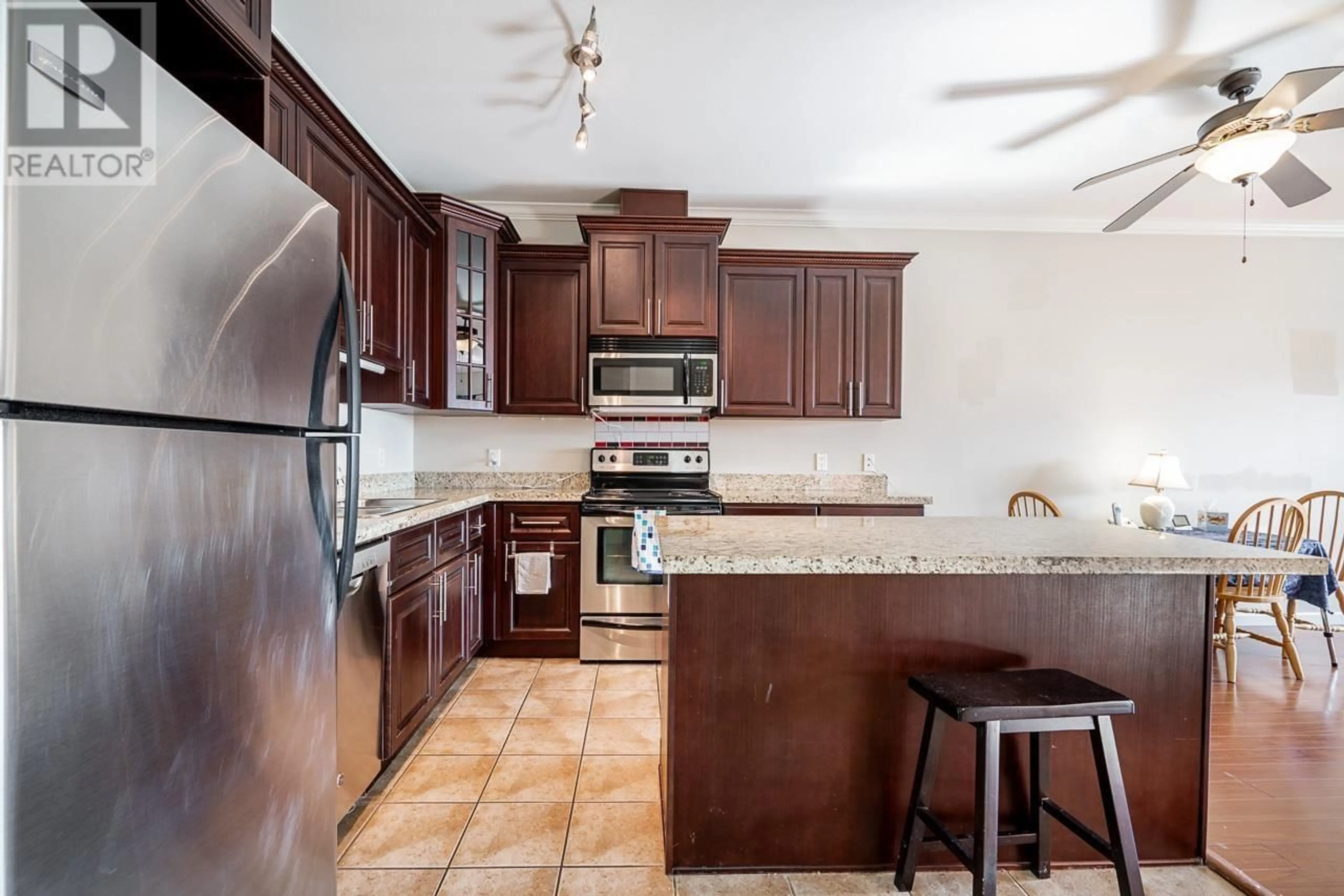 Open concept kitchen, ceramic/tile floor for 408 22363 SELKIRK AVENUE, Maple Ridge British Columbia V2X2X6