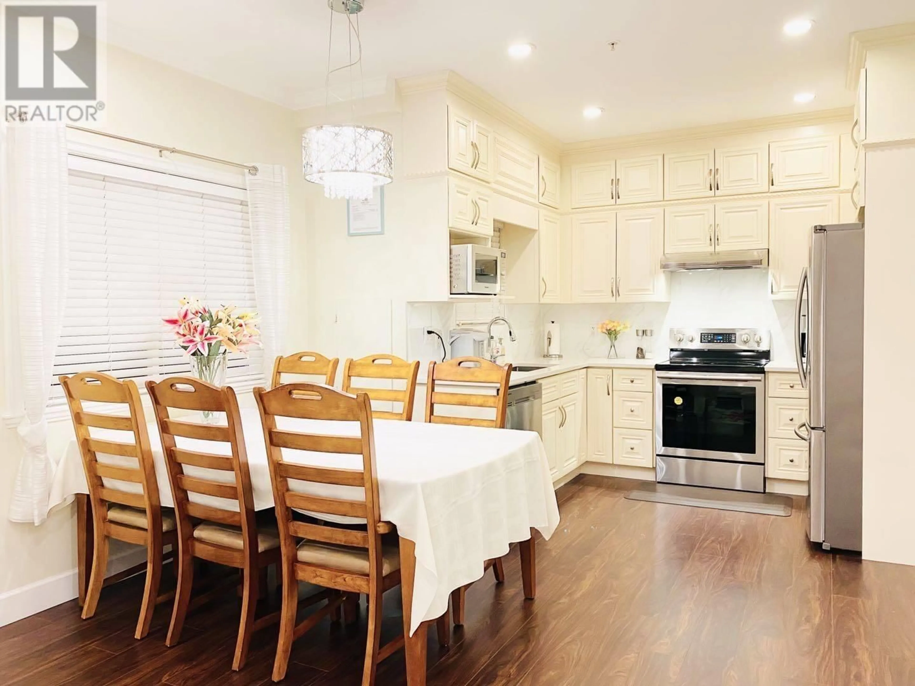Open concept kitchen, wood/laminate floor for 6451 BEATRICE STREET, Vancouver British Columbia V5P3R5
