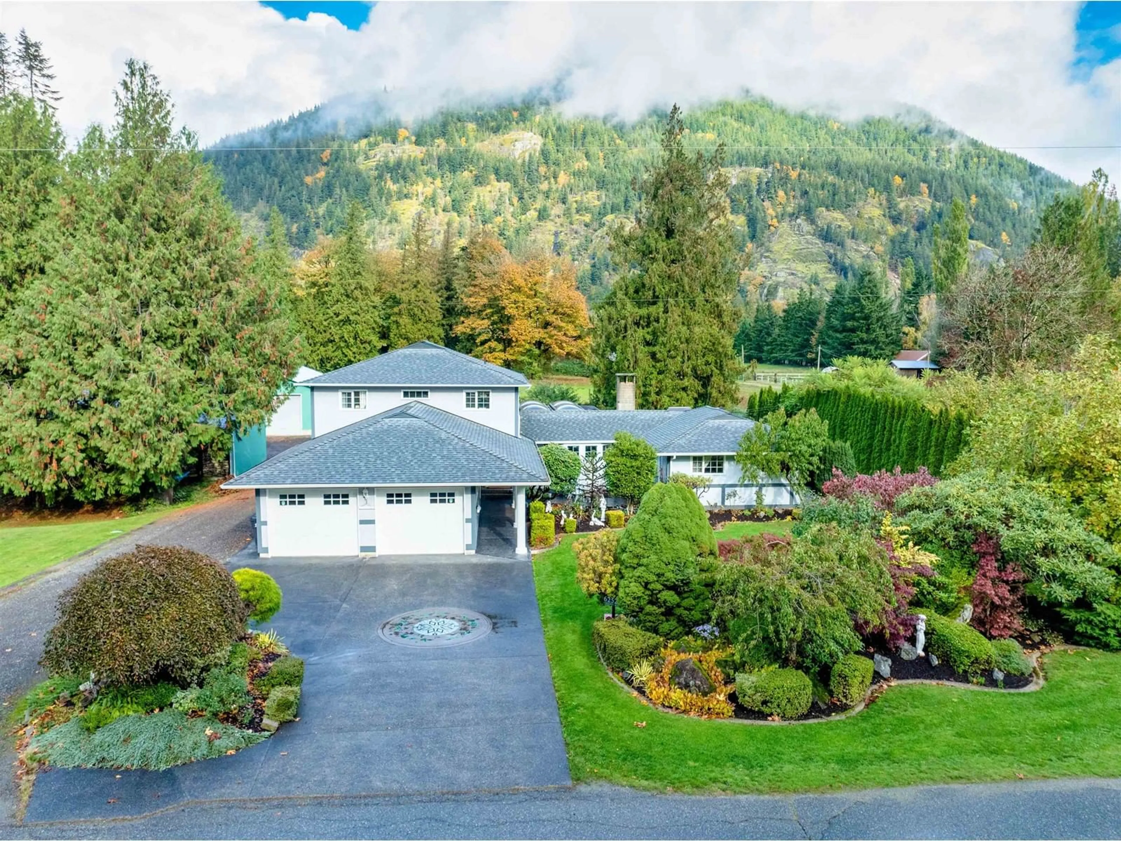 A pic from outside/outdoor area/front of a property/back of a property/a pic from drone, mountain view for 62525 AIRPORT ROAD, Hope British Columbia V0X1L2