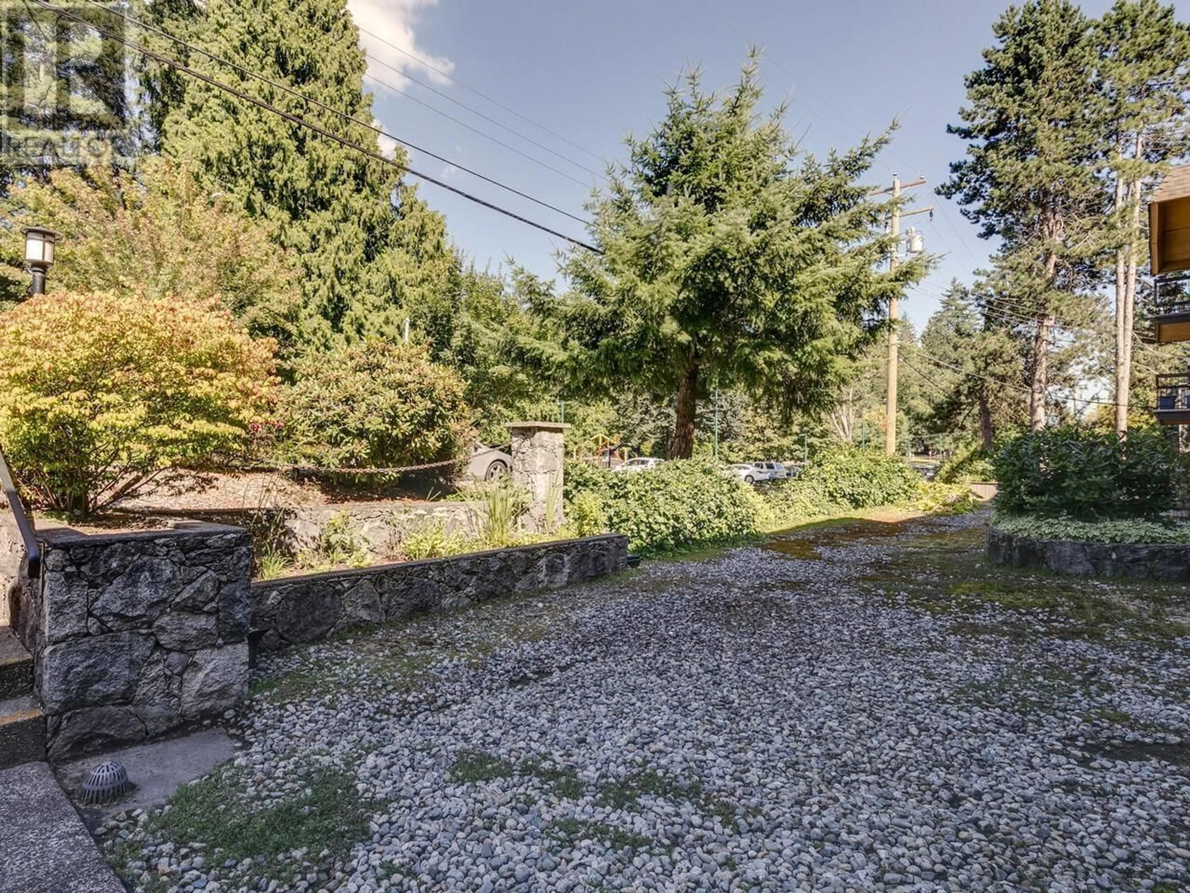 Patio, forest/trees view for 203 - 1000 KING ALBERT AVENUE, Coquitlam British Columbia V3J7A3
