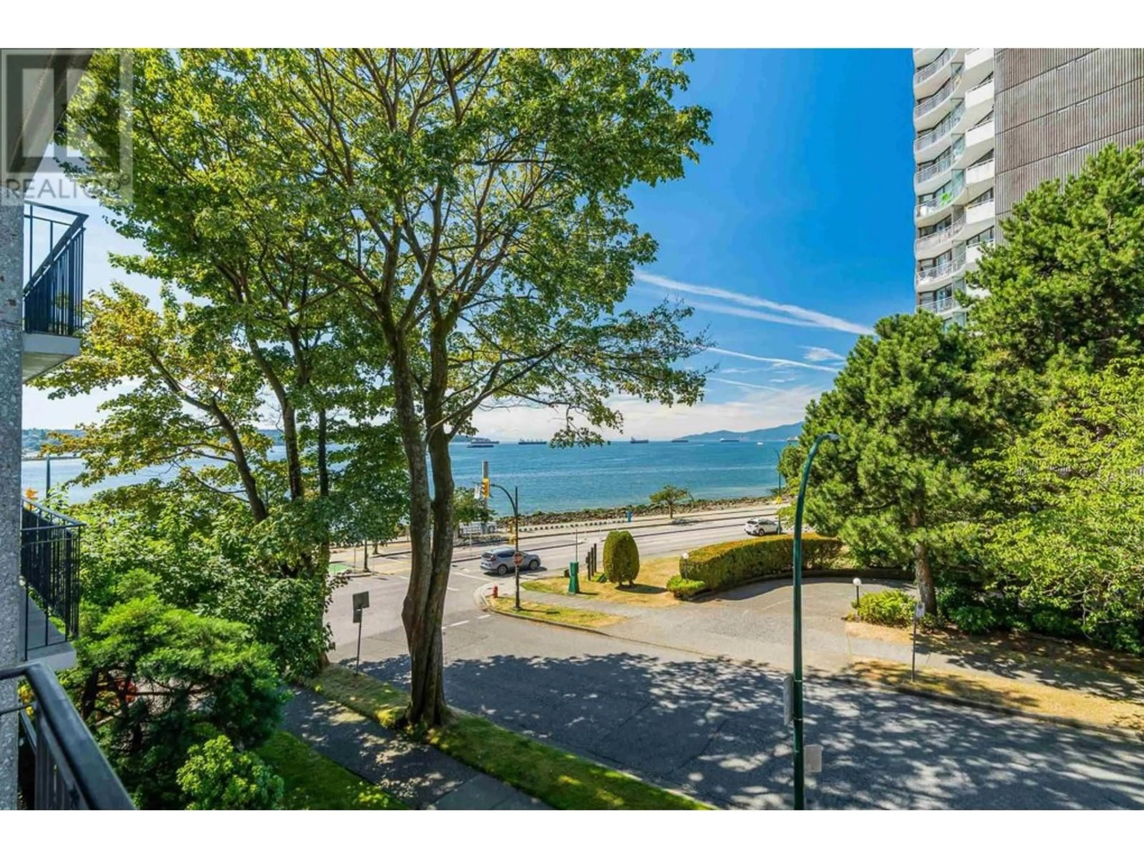 A pic from outside/outdoor area/front of a property/back of a property/a pic from drone, water/lake/river/ocean view for 303 1575 BEACH AVENUE, Vancouver British Columbia V6G1Y5