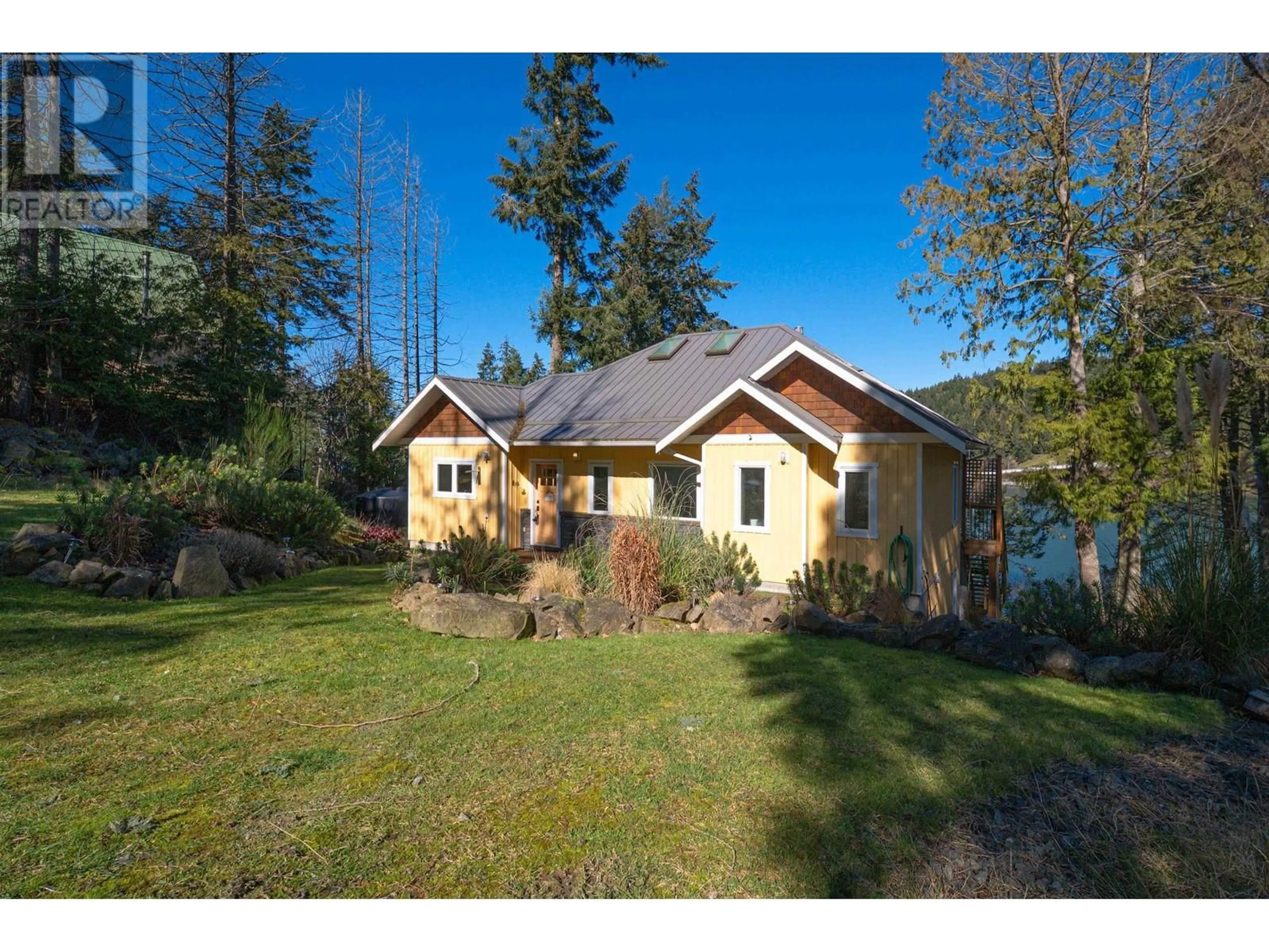 A pic from outside/outdoor area/front of a property/back of a property/a pic from drone, unknown for 225 MARINERS WAY, Mayne Island British Columbia V0N2J2