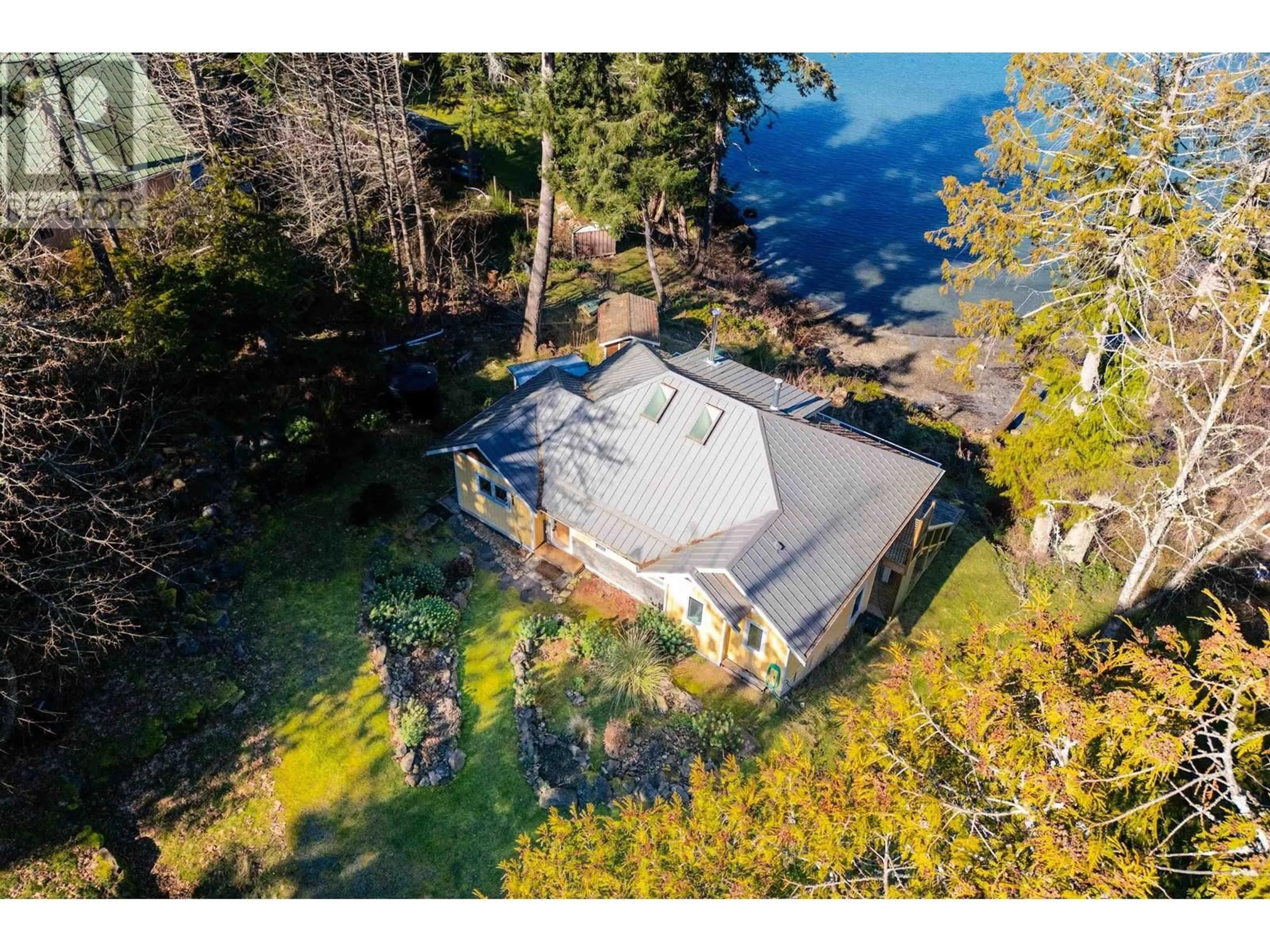 A pic from outside/outdoor area/front of a property/back of a property/a pic from drone, water/lake/river/ocean view for 225 MARINERS WAY, Mayne Island British Columbia V0N2J2