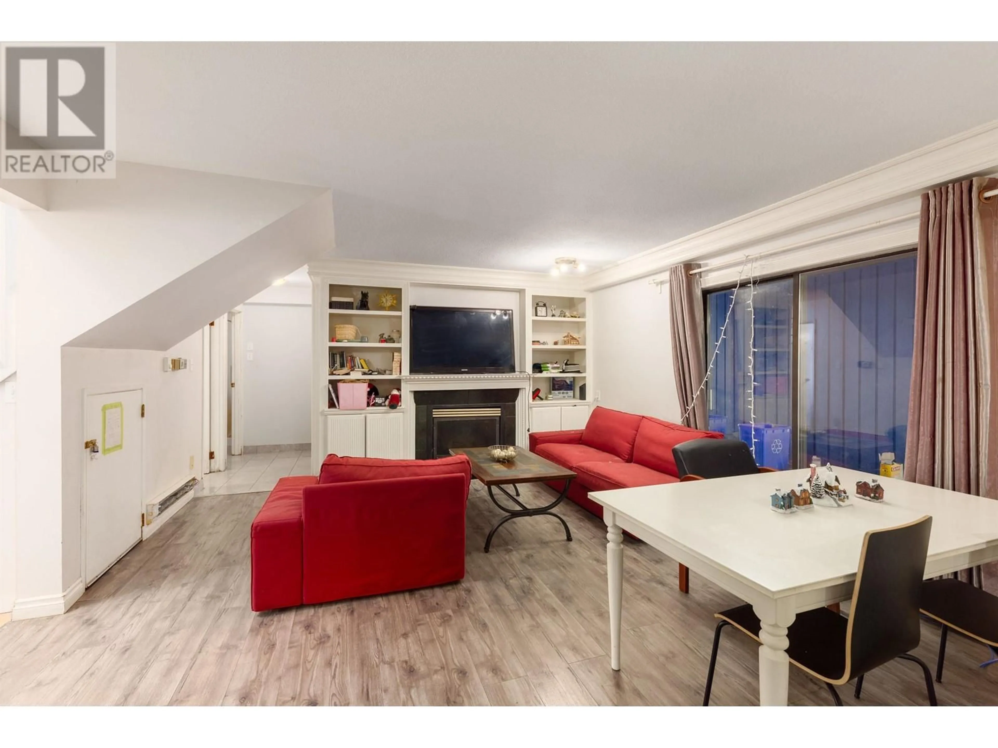 Living room with furniture, wood/laminate floor for 5280 SPERLING AVENUE, Burnaby British Columbia V5E2T5