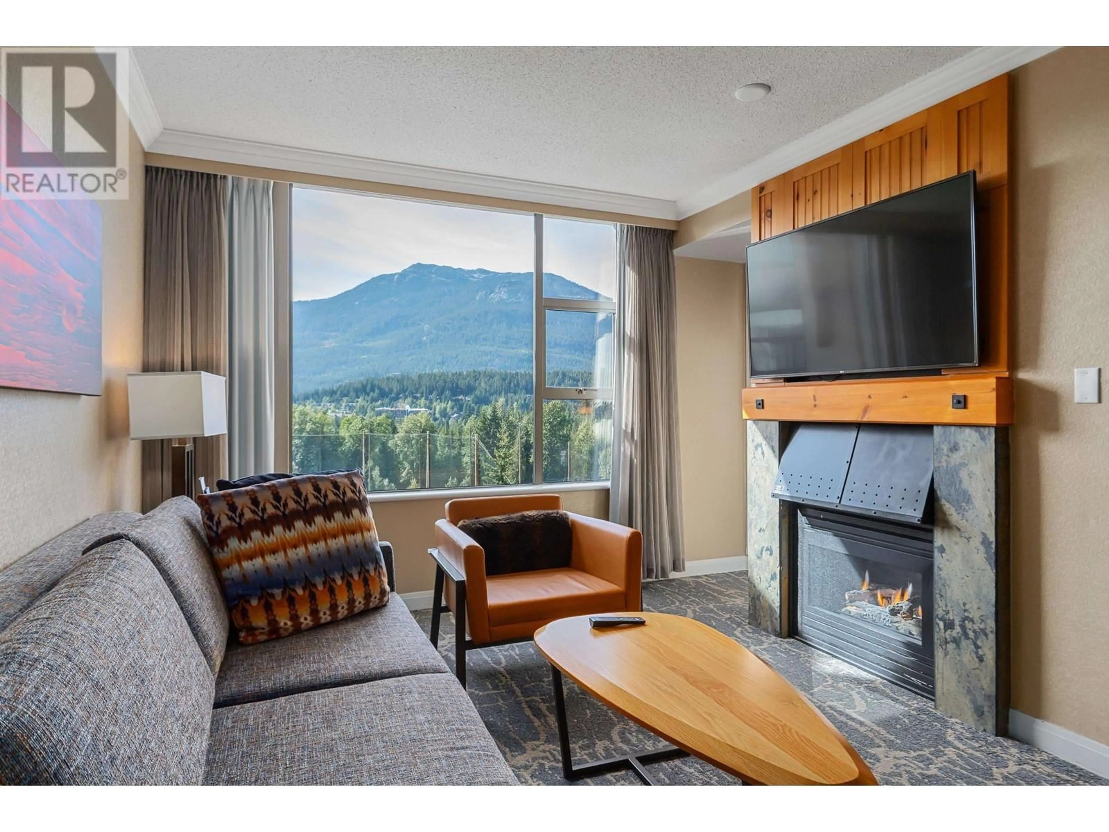 Living room with furniture, unknown for 958 - 4090 WHISTLER WAY, Whistler British Columbia V8E1J3