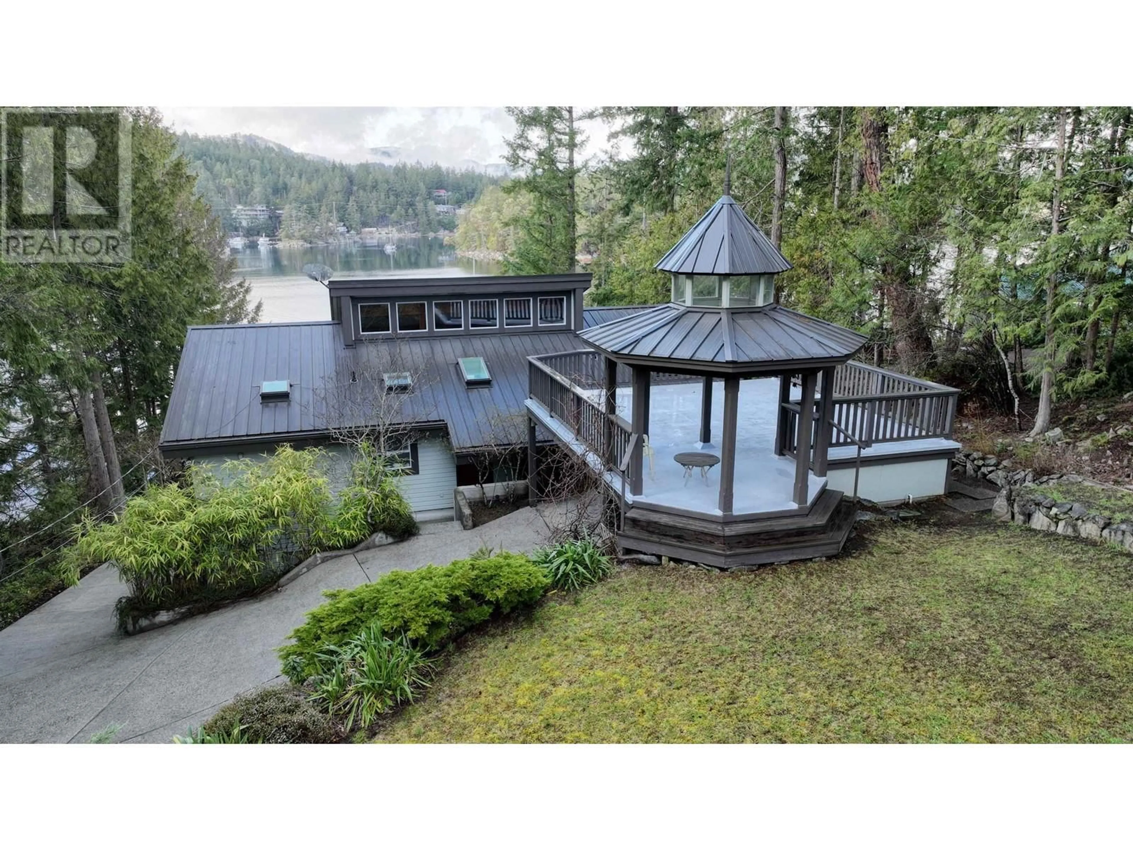 A pic from outside/outdoor area/front of a property/back of a property/a pic from drone, water/lake/river/ocean view for 12825 ALEXANDER ROAD, Pender Harbour British Columbia V0N2H1
