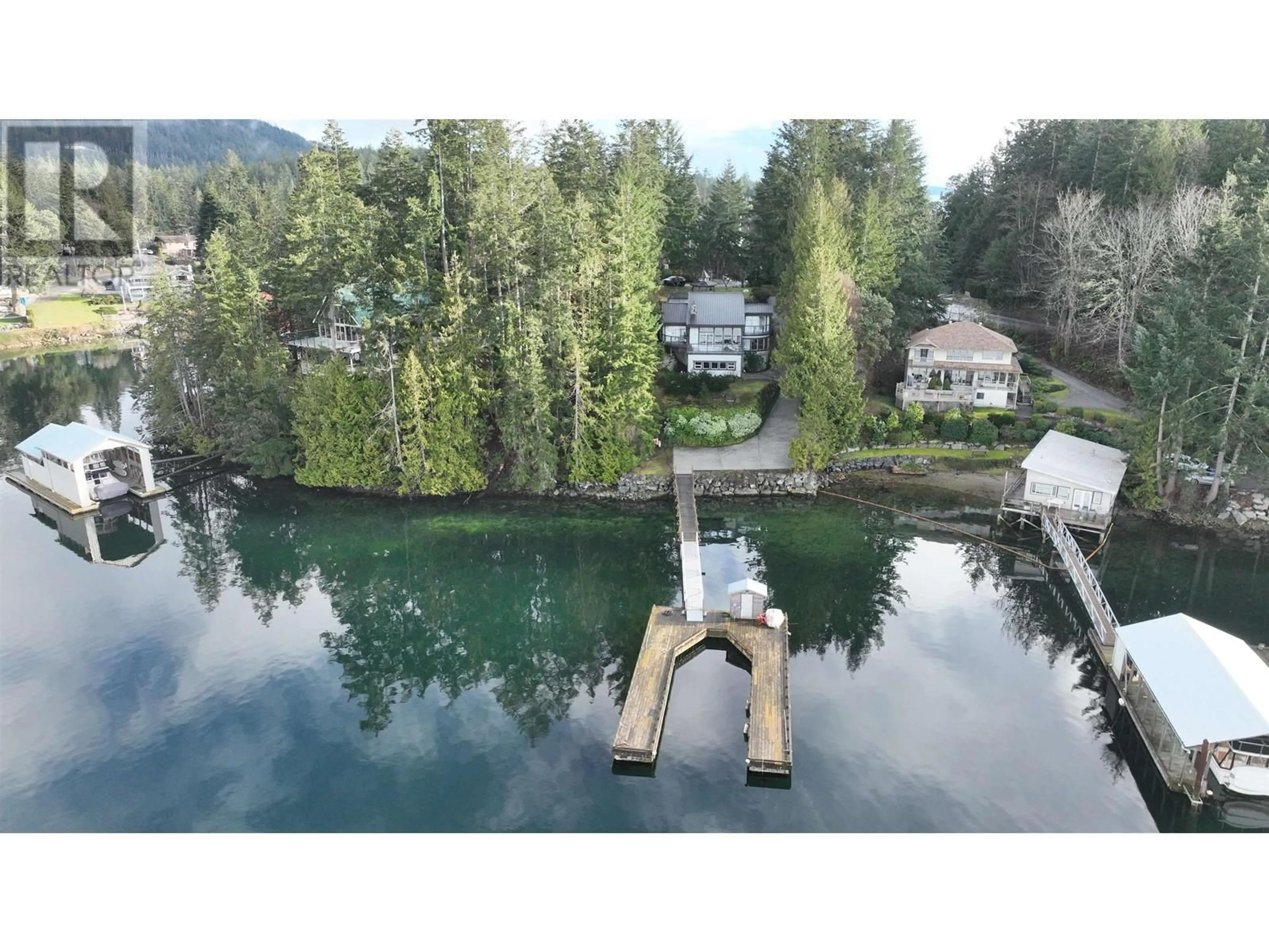 A pic from outside/outdoor area/front of a property/back of a property/a pic from drone, water/lake/river/ocean view for 12825 ALEXANDER ROAD, Pender Harbour British Columbia V0N2H1