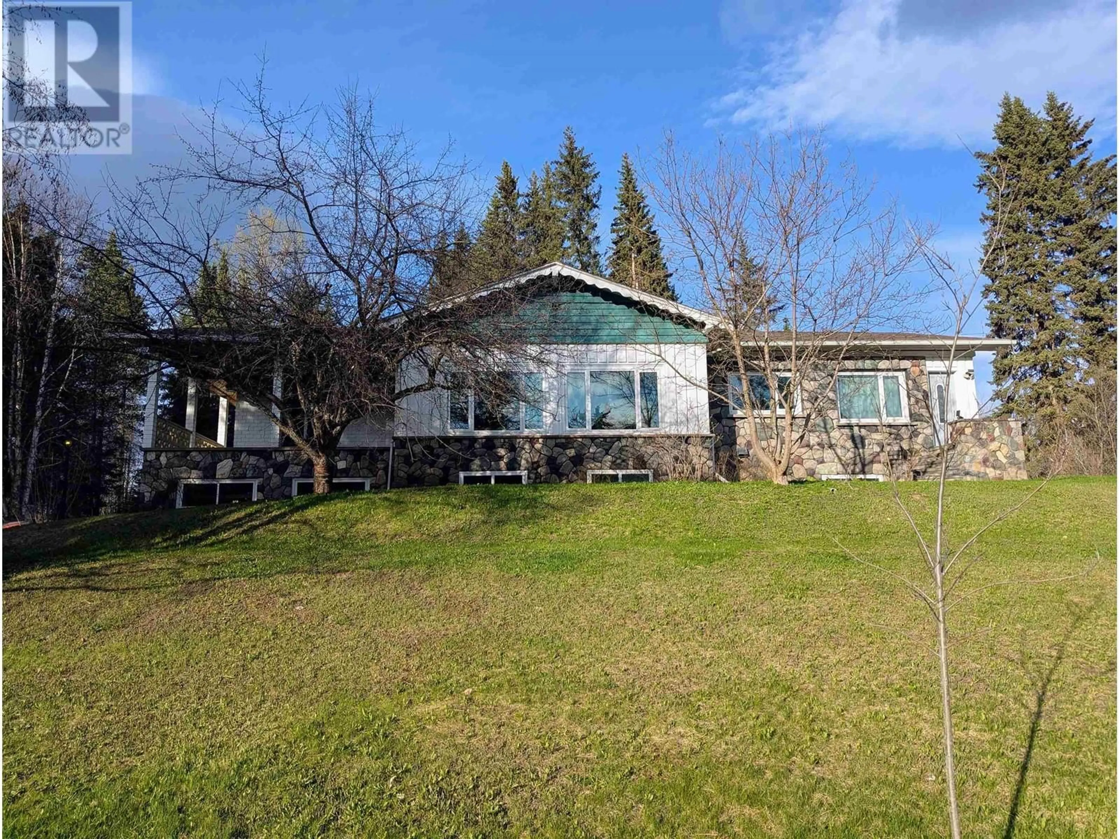 A pic from outside/outdoor area/front of a property/back of a property/a pic from drone, unknown for 4620 MANTON ROAD, Smithers British Columbia V0J2N0