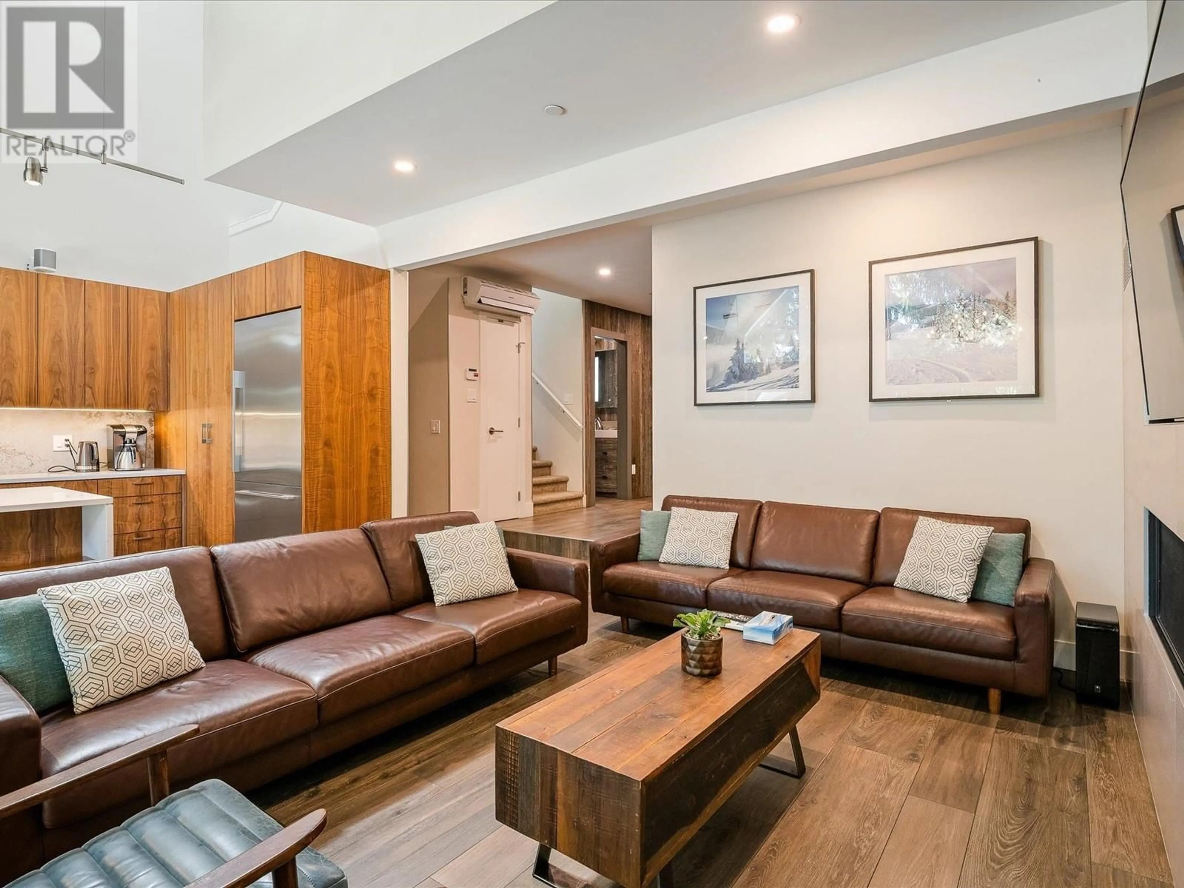 Living room with furniture, wood/laminate floor for 23 - 4700 GLACIER DRIVE, Whistler British Columbia V8E1M8