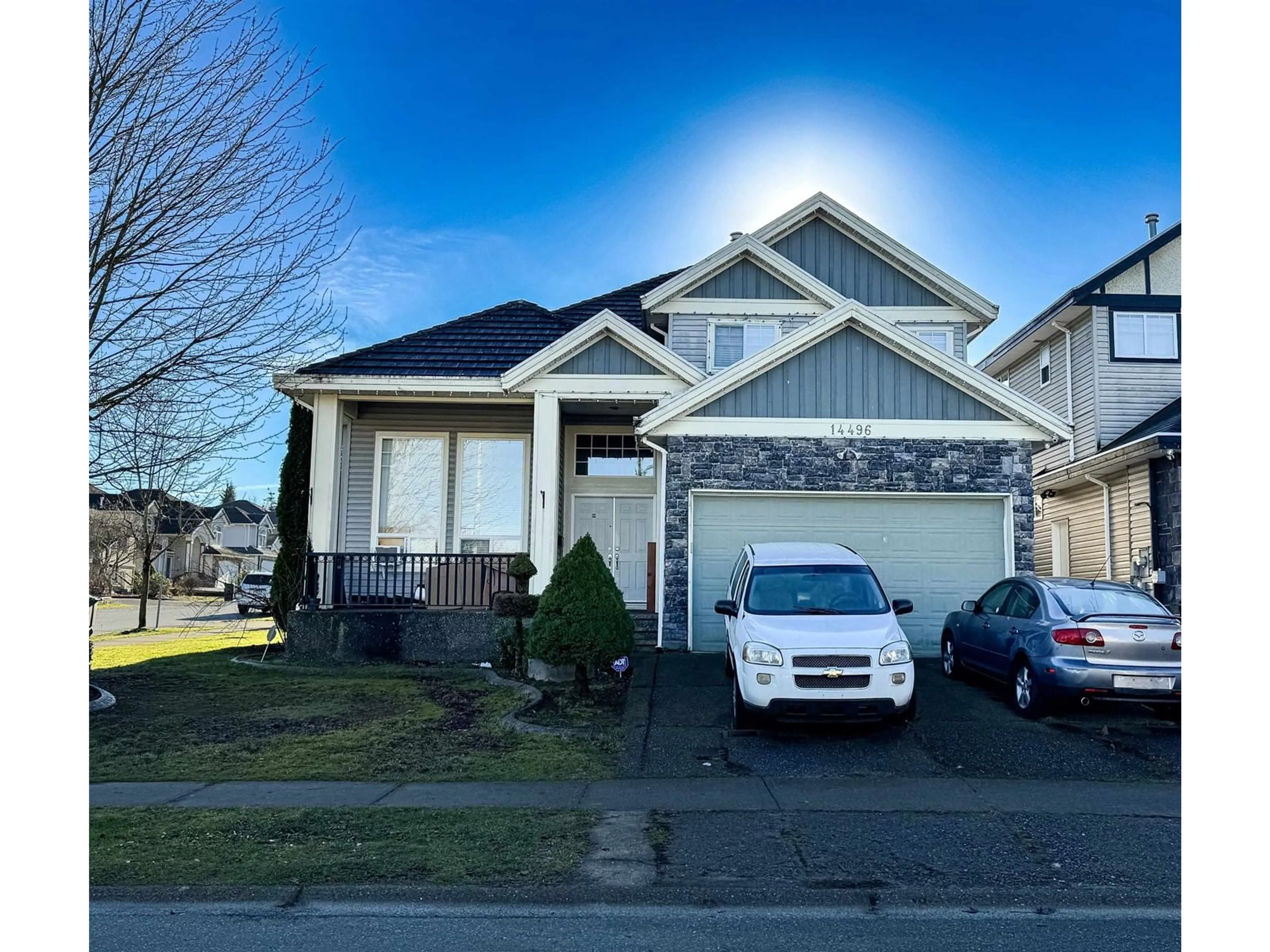 Home with vinyl exterior material, street for 14496 74, Surrey British Columbia V3S0N1