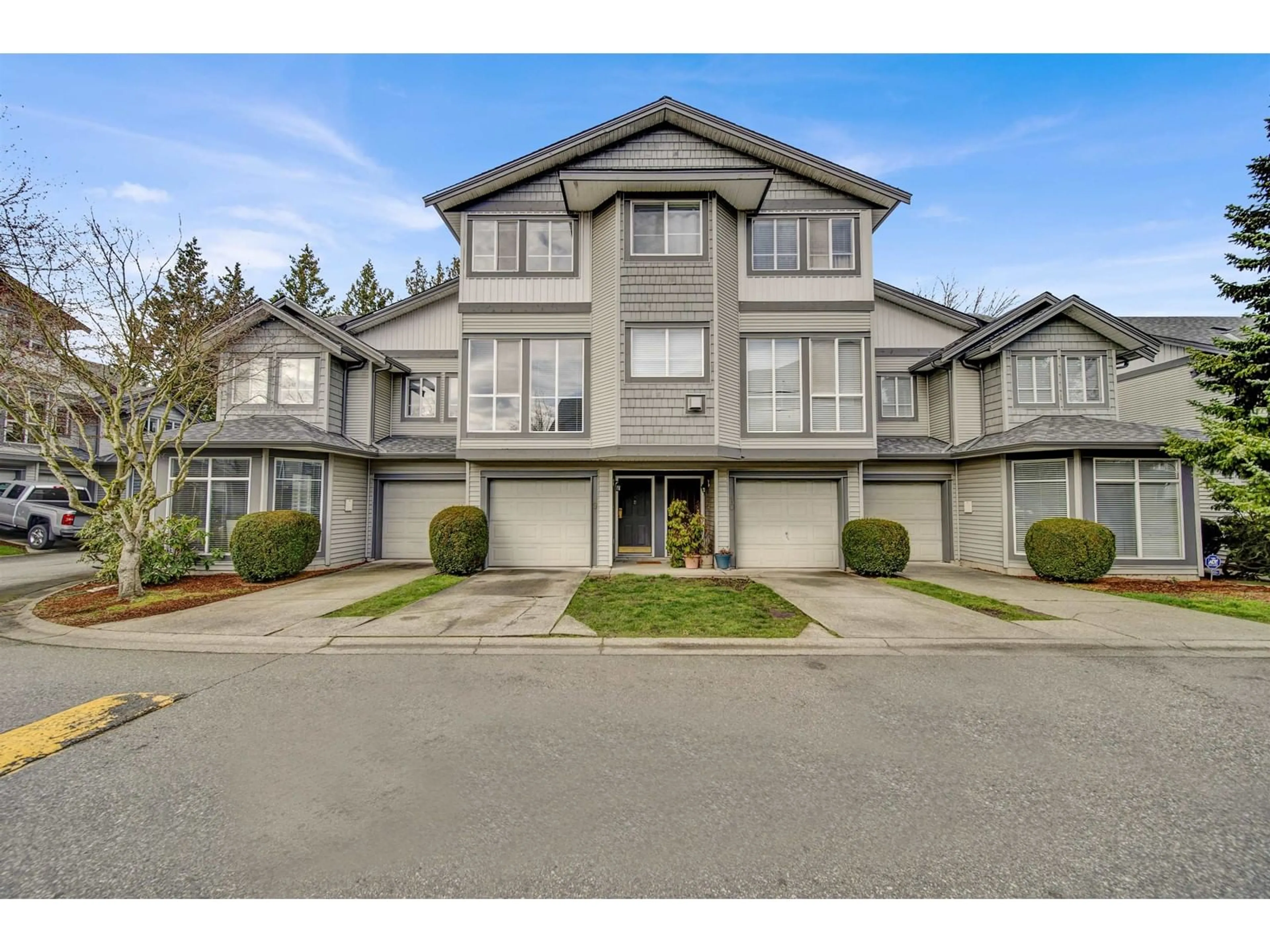 A pic from outside/outdoor area/front of a property/back of a property/a pic from drone, street for 9 - 7250 144, Surrey British Columbia V3W1L7