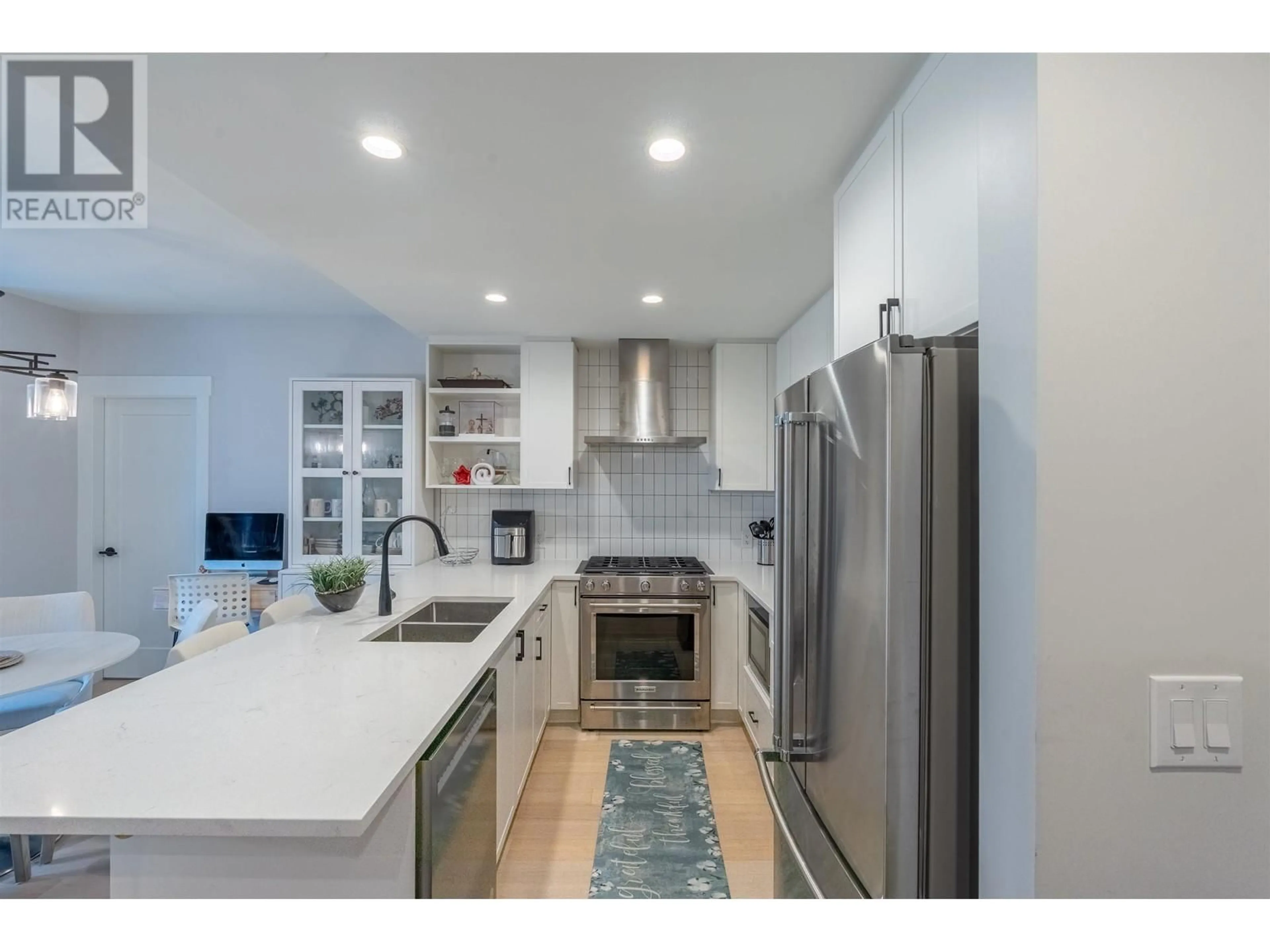 Open concept kitchen, ceramic/tile floor for 210 - 22226 BROWN AVENUE, Maple Ridge British Columbia V2X4R2