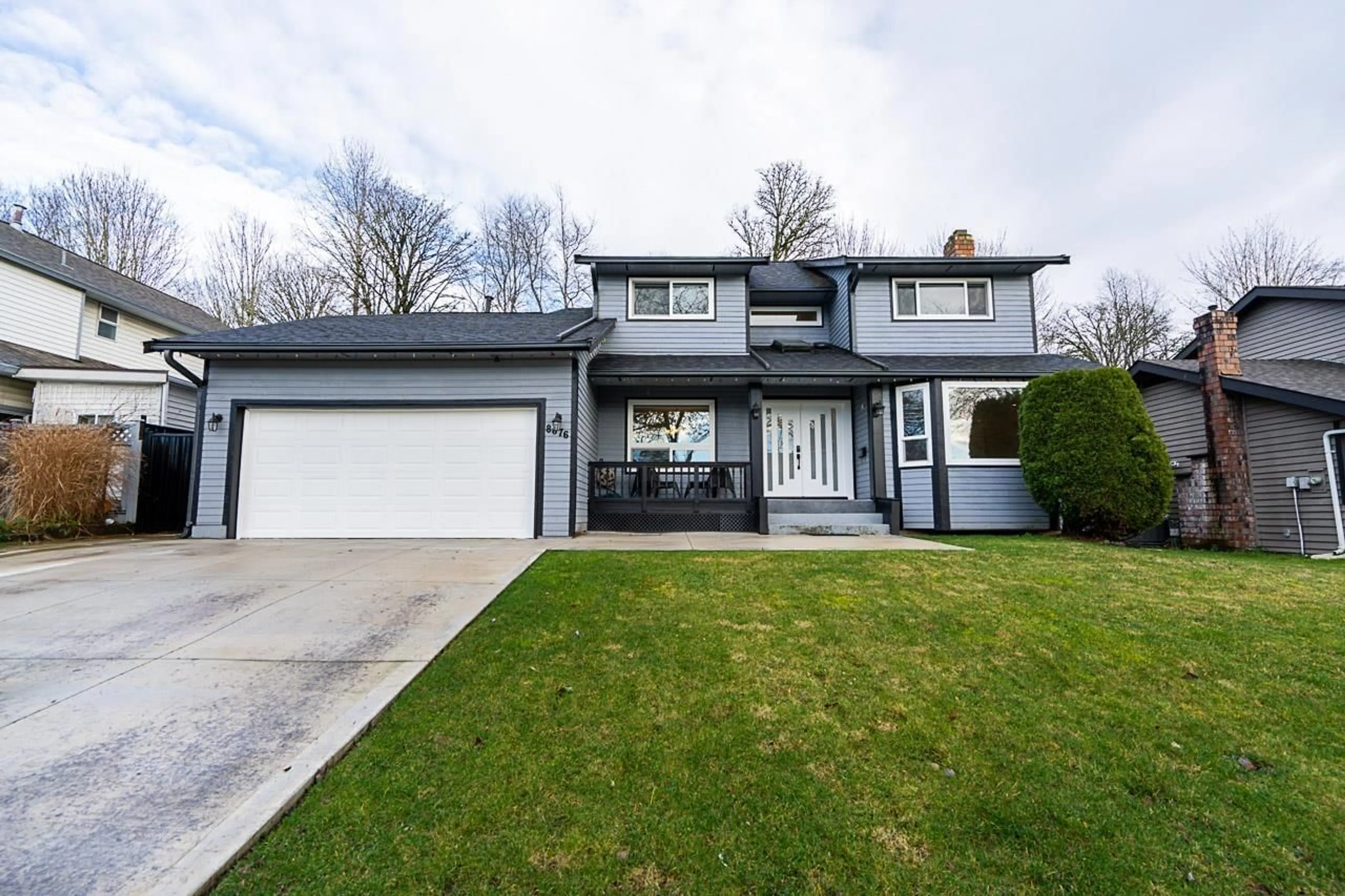 Home with vinyl exterior material, street for 8676 146A, Surrey British Columbia V3S6N7