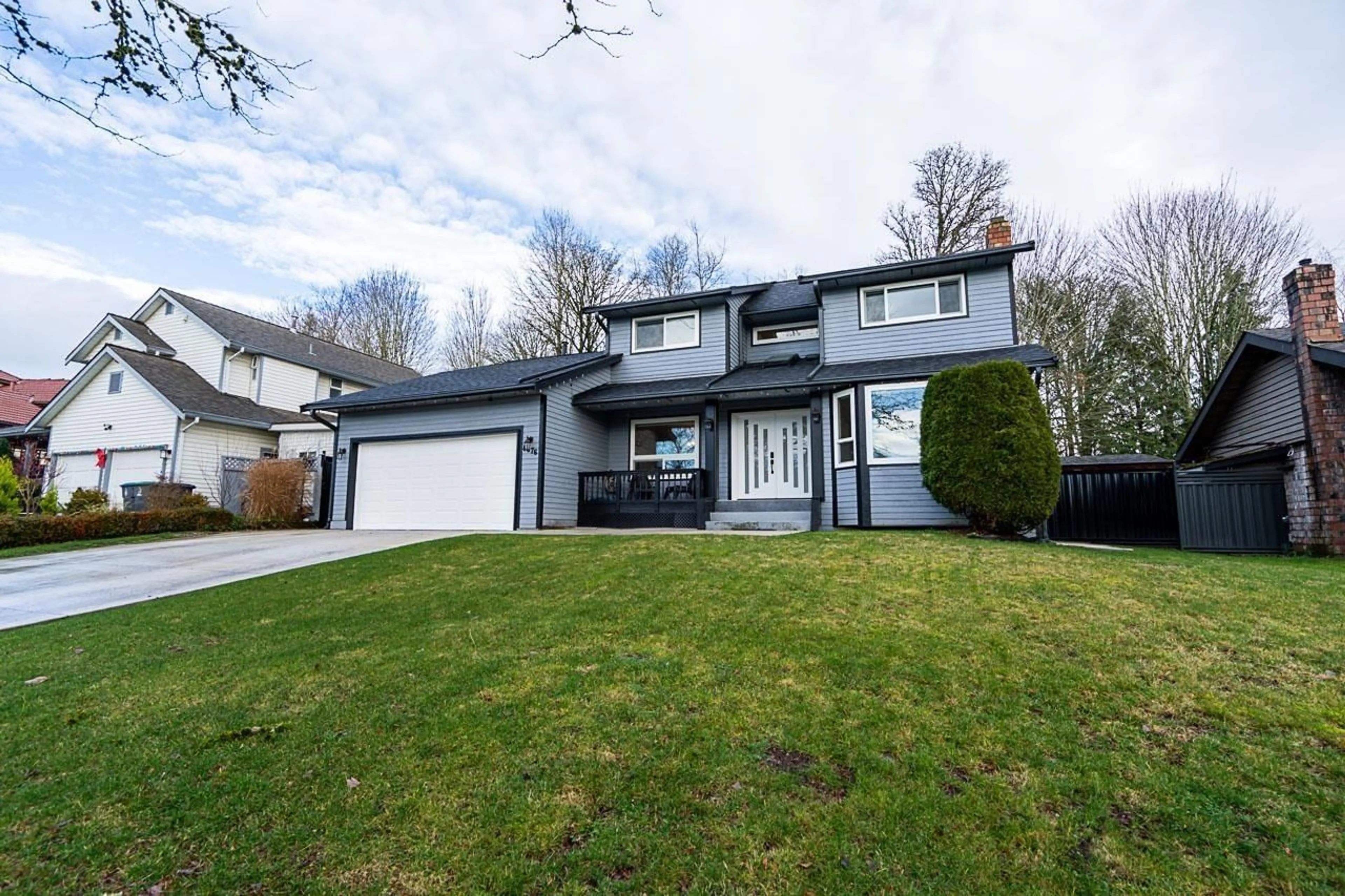 Home with vinyl exterior material, street for 8676 146A, Surrey British Columbia V3S6N7