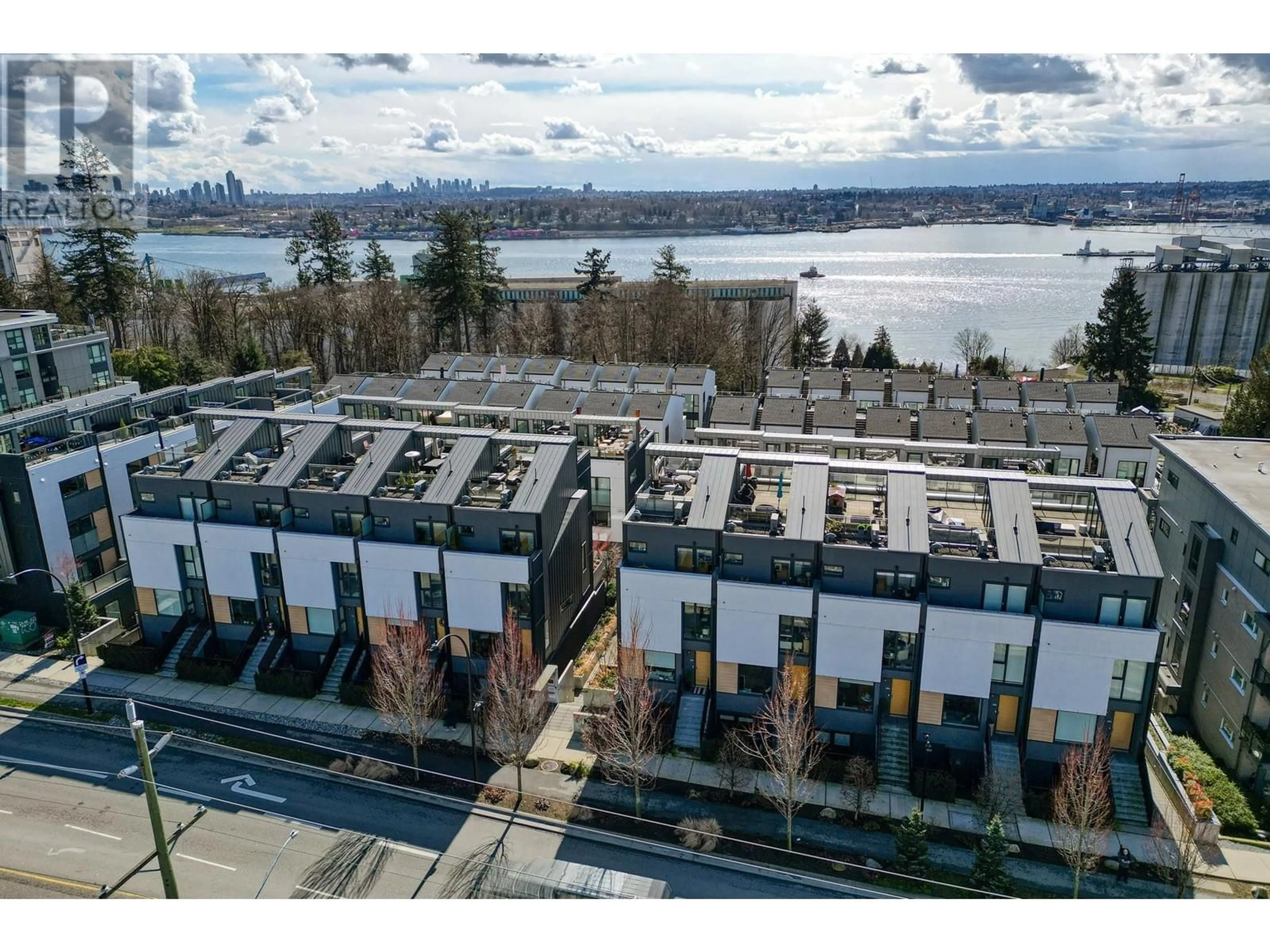 A pic from outside/outdoor area/front of a property/back of a property/a pic from drone, water/lake/river/ocean view for 101 - 649 3RD STREET, North Vancouver British Columbia V7L1G6