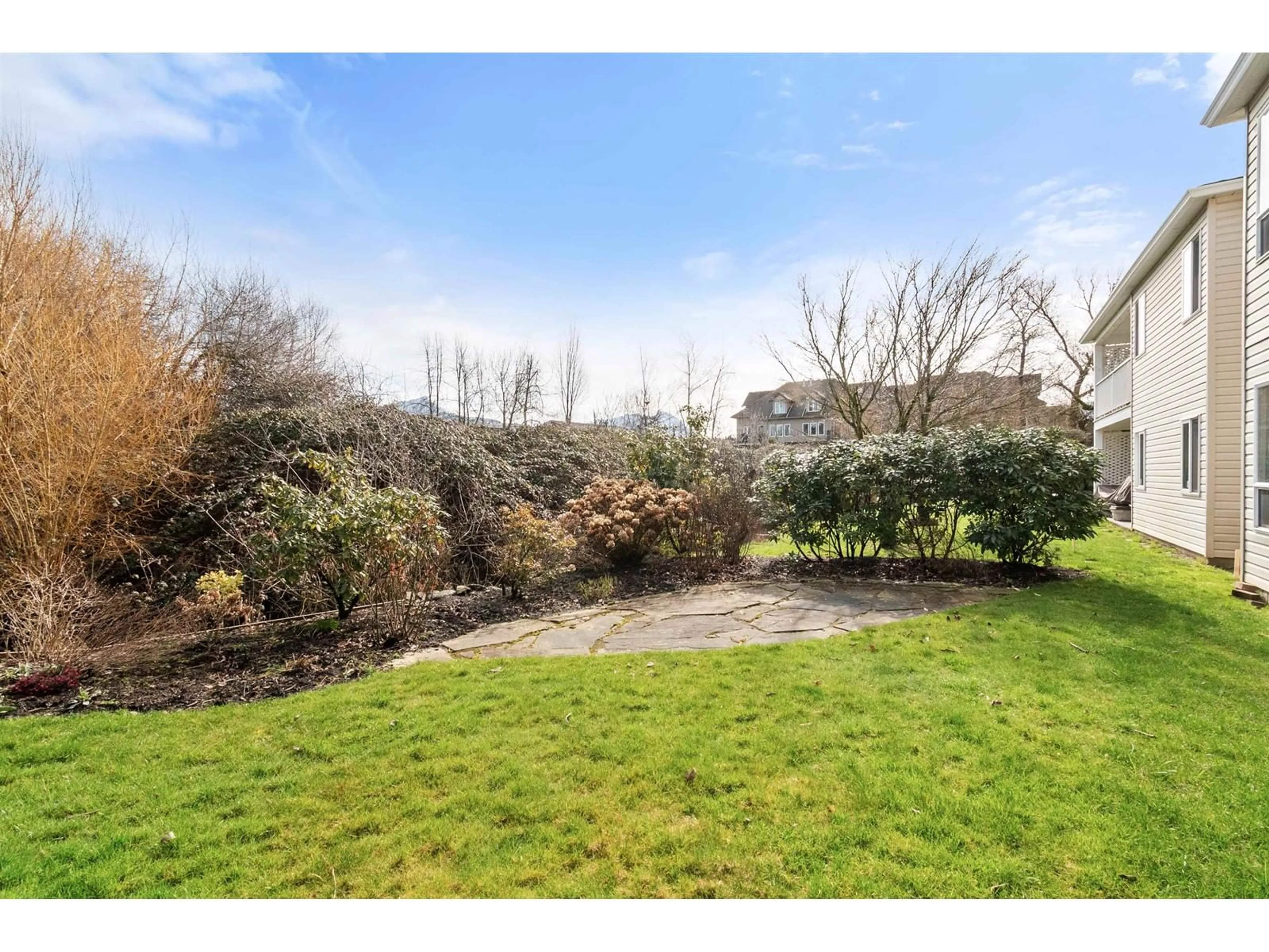 A pic from outside/outdoor area/front of a property/back of a property/a pic from drone, unknown for 11 - 8500 YOUNG ROAD, Chilliwack British Columbia V2P4P1