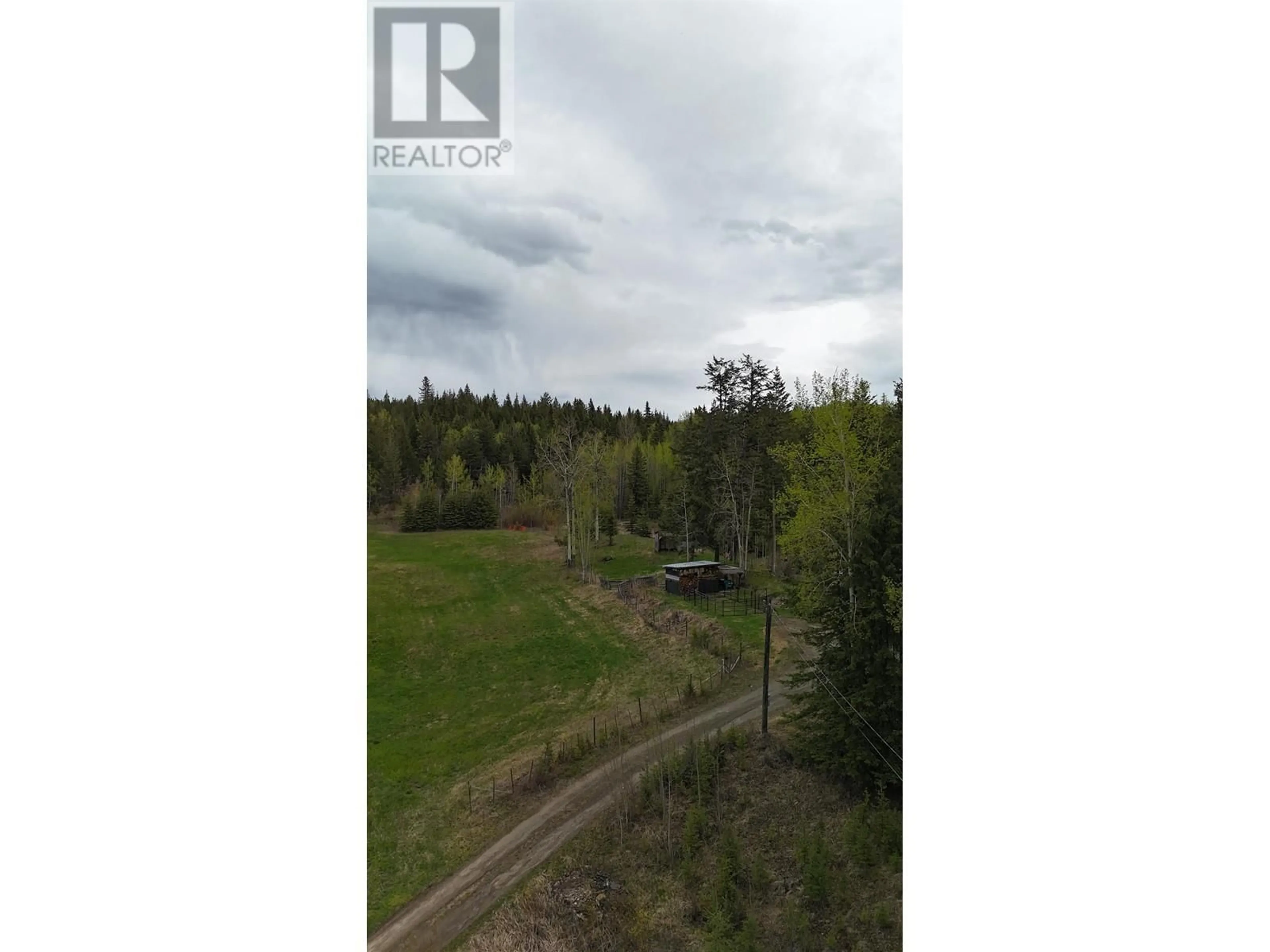 A pic from outside/outdoor area/front of a property/back of a property/a pic from drone, forest/trees view for 3729 SPOKIN LAKE ROAD, Williams Lake British Columbia V0K2G0