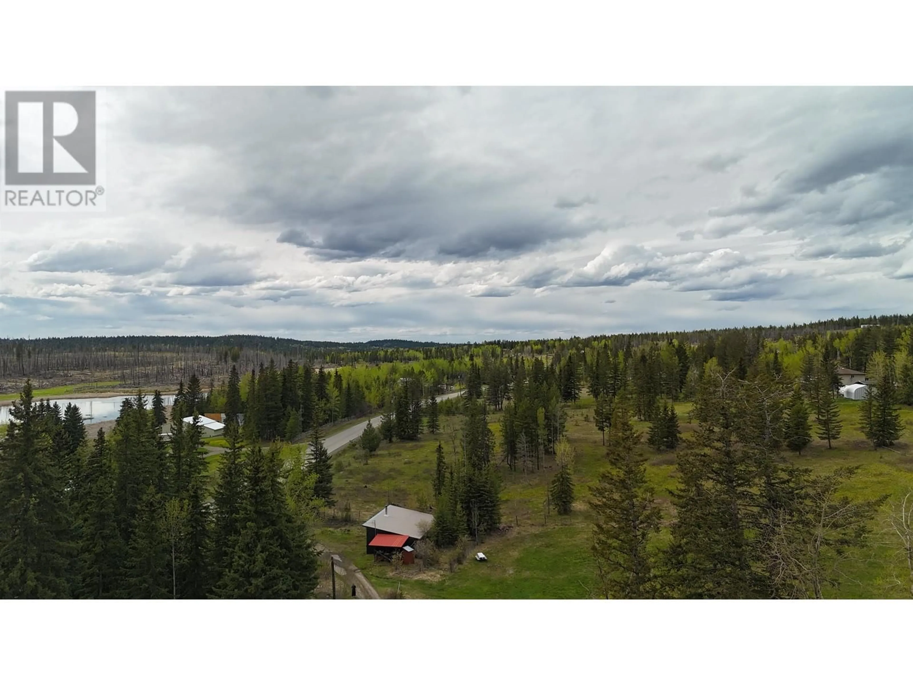 A pic from outside/outdoor area/front of a property/back of a property/a pic from drone, forest/trees view for 3729 SPOKIN LAKE ROAD, Williams Lake British Columbia V0K2G0