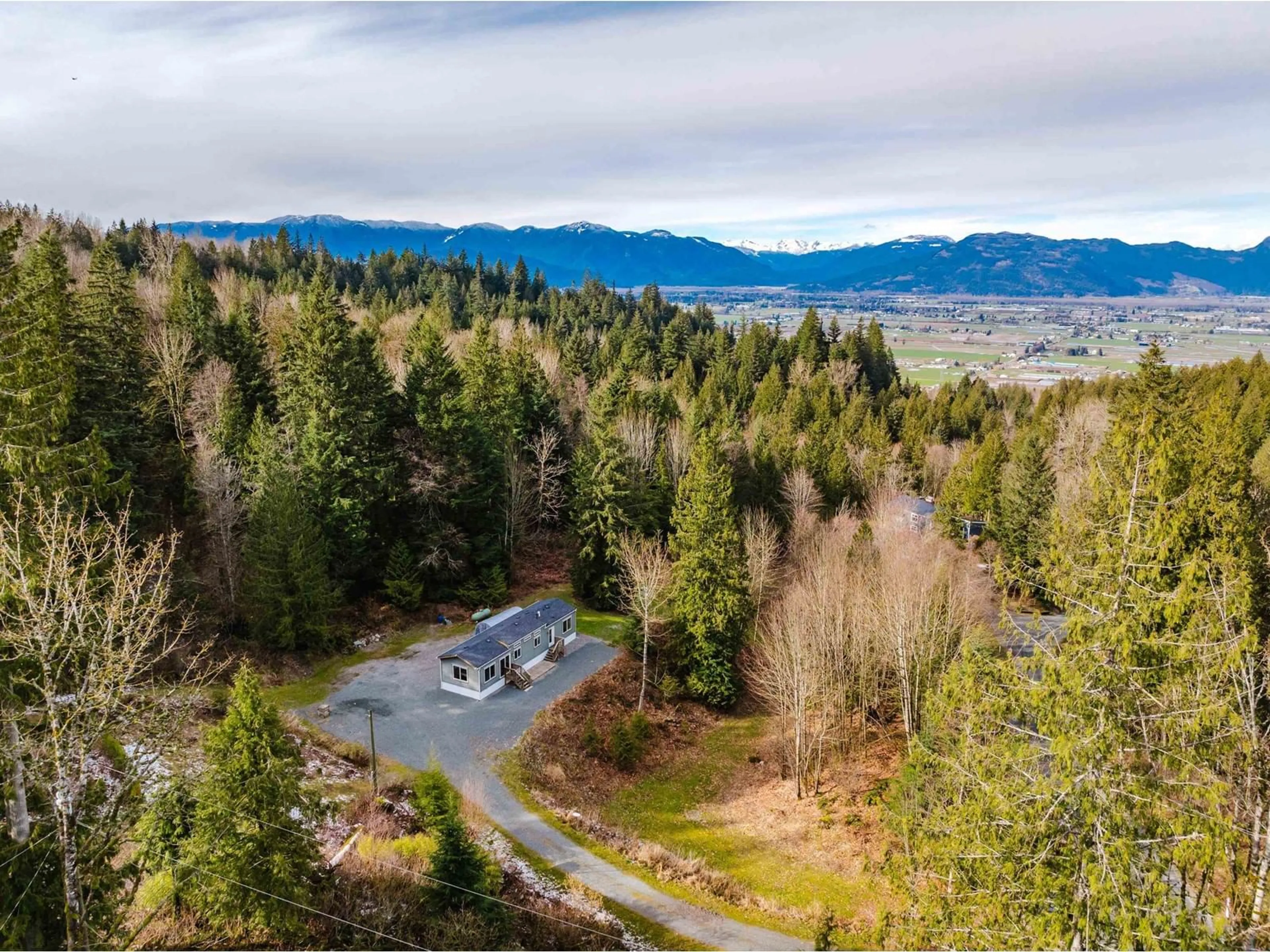 A pic from outside/outdoor area/front of a property/back of a property/a pic from drone, forest/trees view for 6650 HINKLEY ROAD, Chilliwack British Columbia V4Z1J4