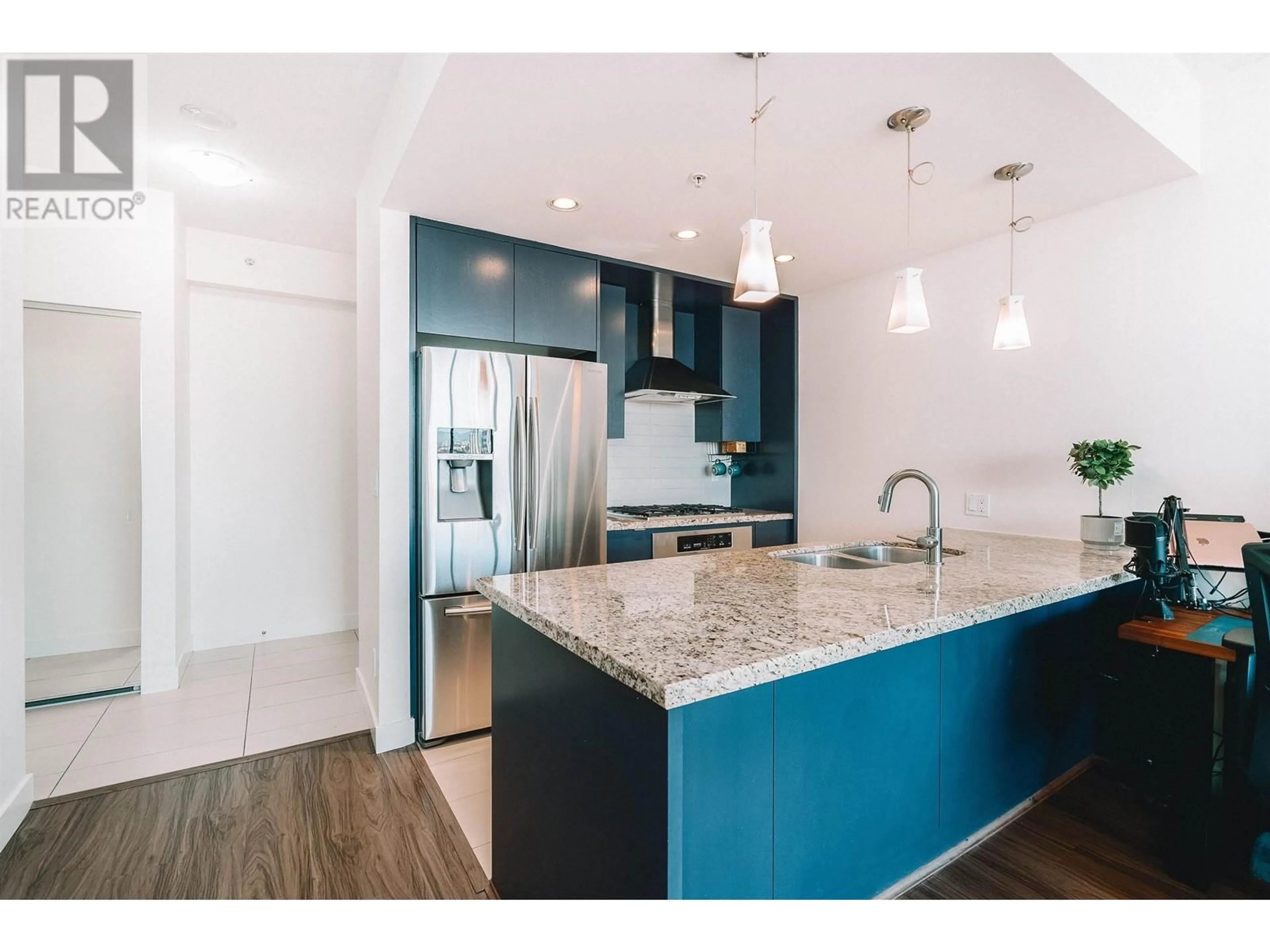Open concept kitchen, wood/laminate floor for 2905 - 7088 18TH AVENUE, Burnaby British Columbia V3N0A2