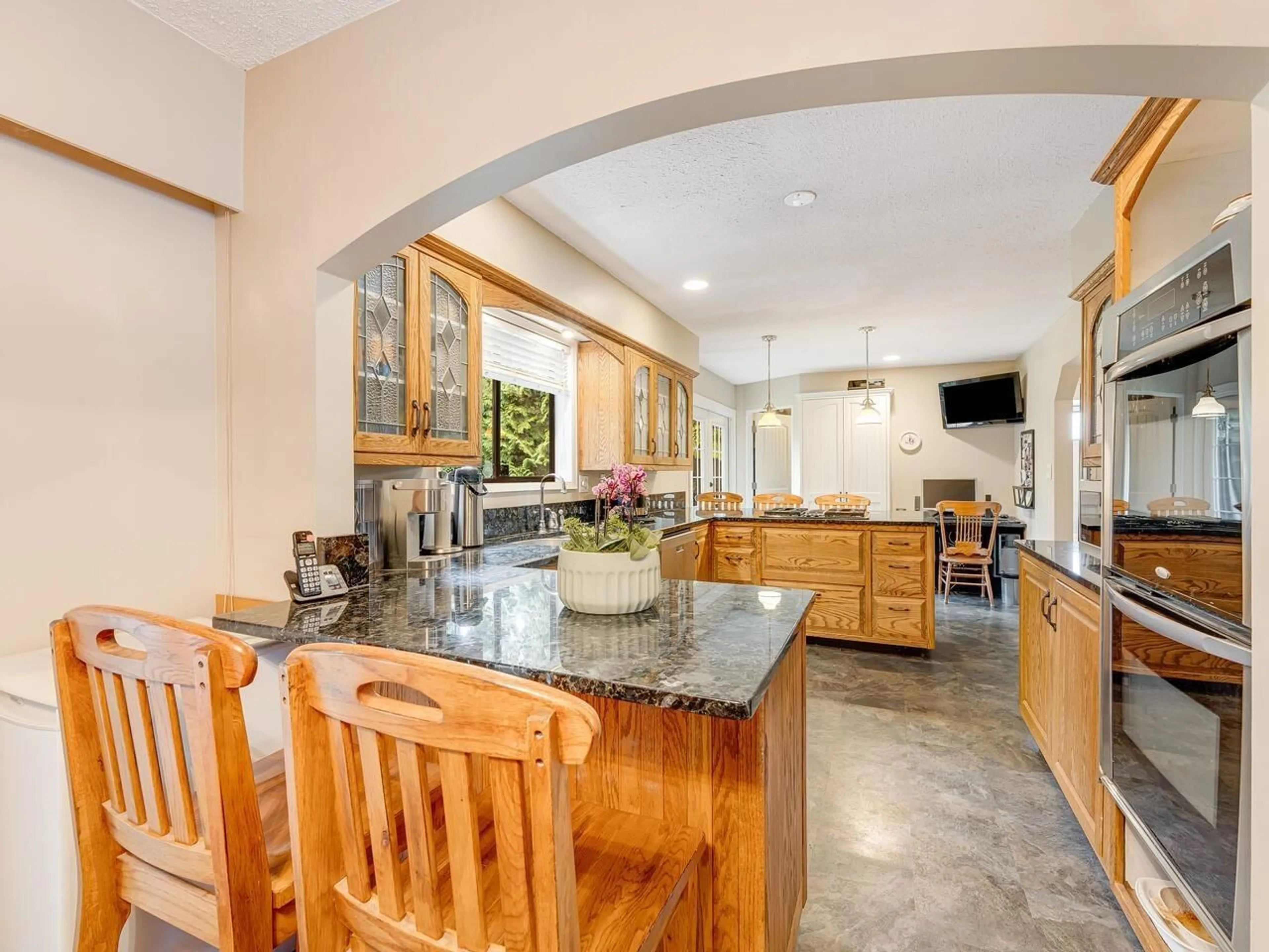 Open concept kitchen, ceramic/tile floor for 9543 OBAN, Surrey British Columbia V3V6Z2
