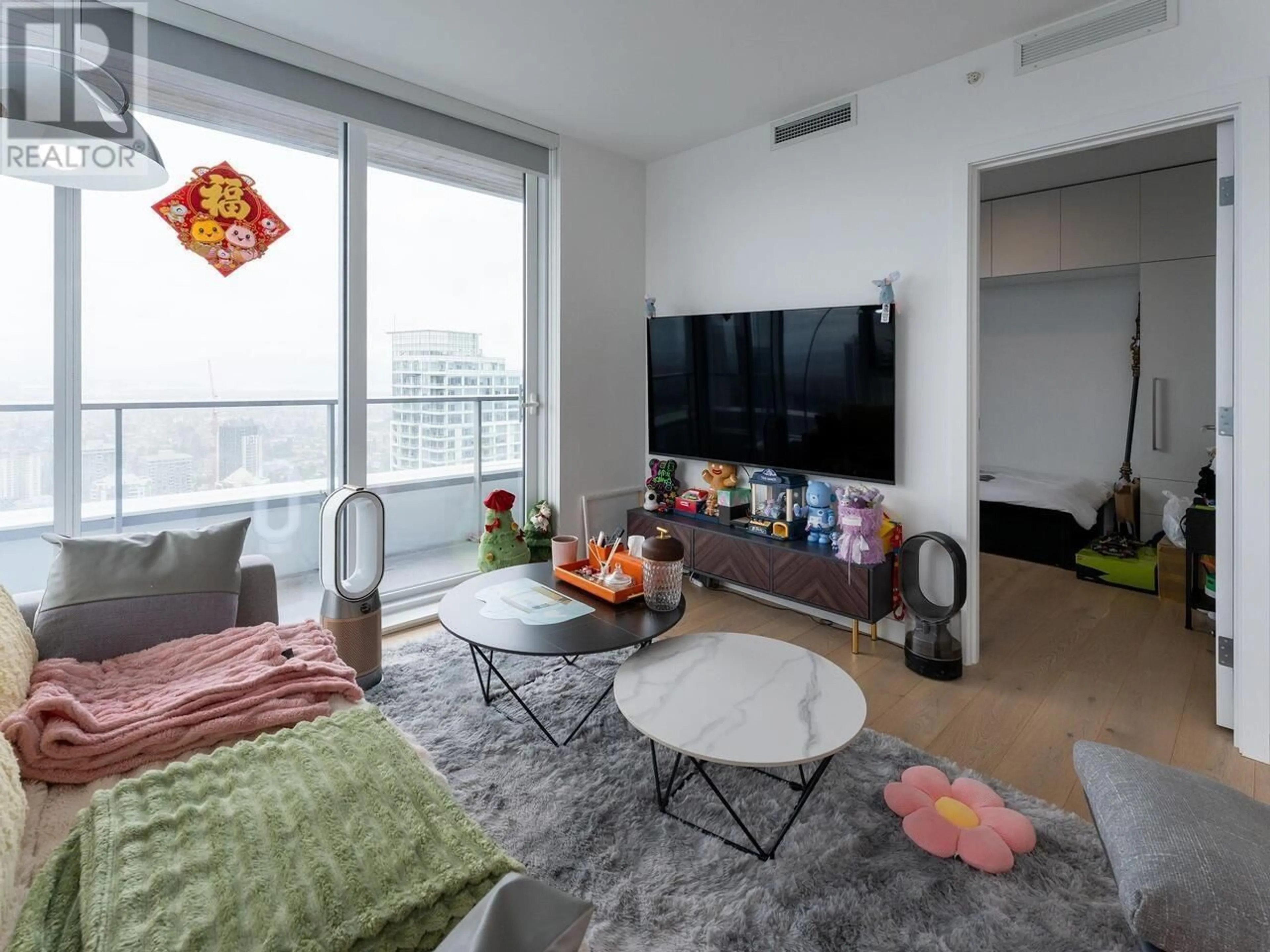 Living room with furniture, unknown for 4404 - 6000 MCKAY AVENUE, Burnaby British Columbia V5H0K2