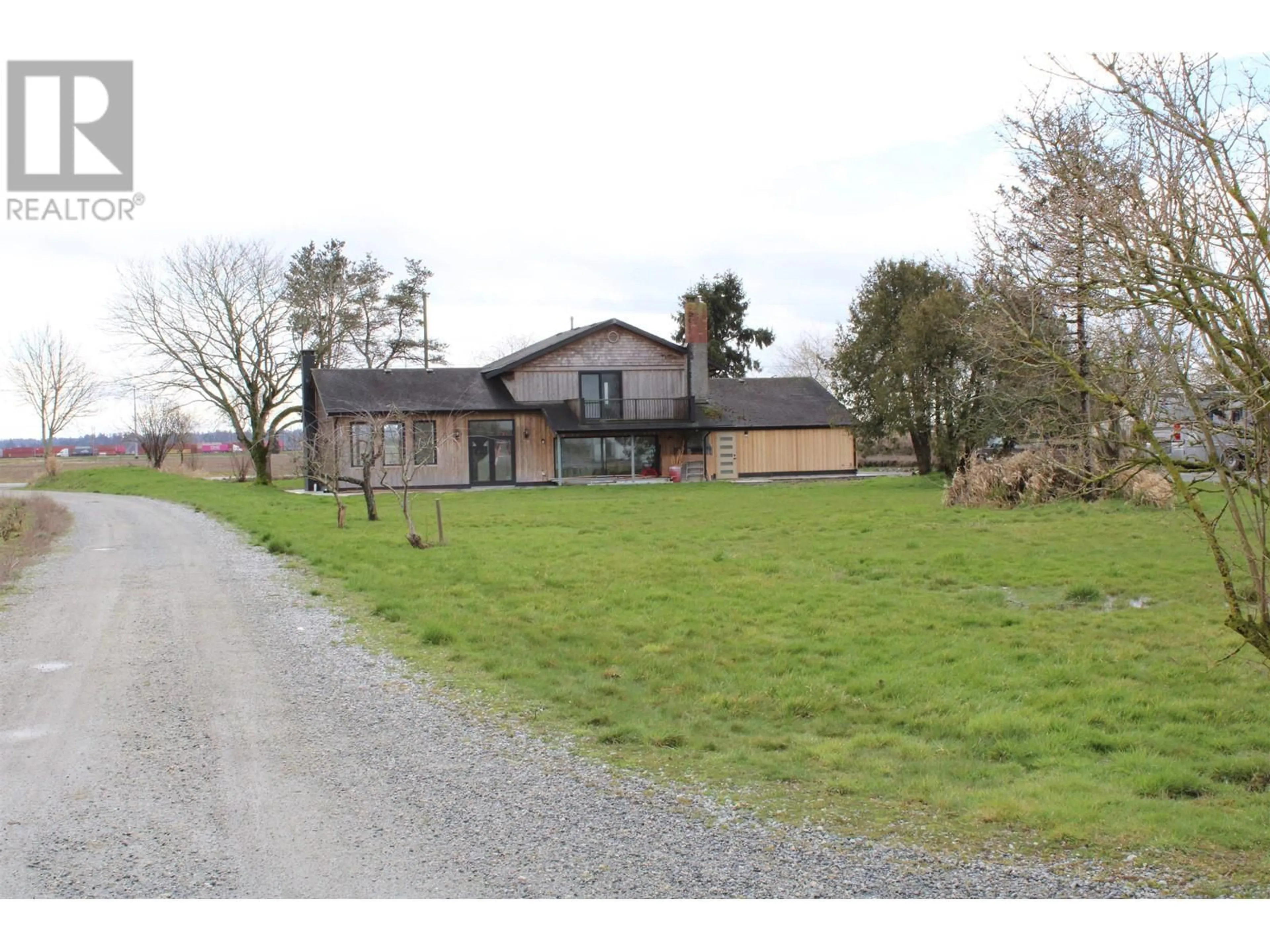 A pic from outside/outdoor area/front of a property/back of a property/a pic from drone, building for 5465 34B AVENUE, Ladner British Columbia V4L2P1