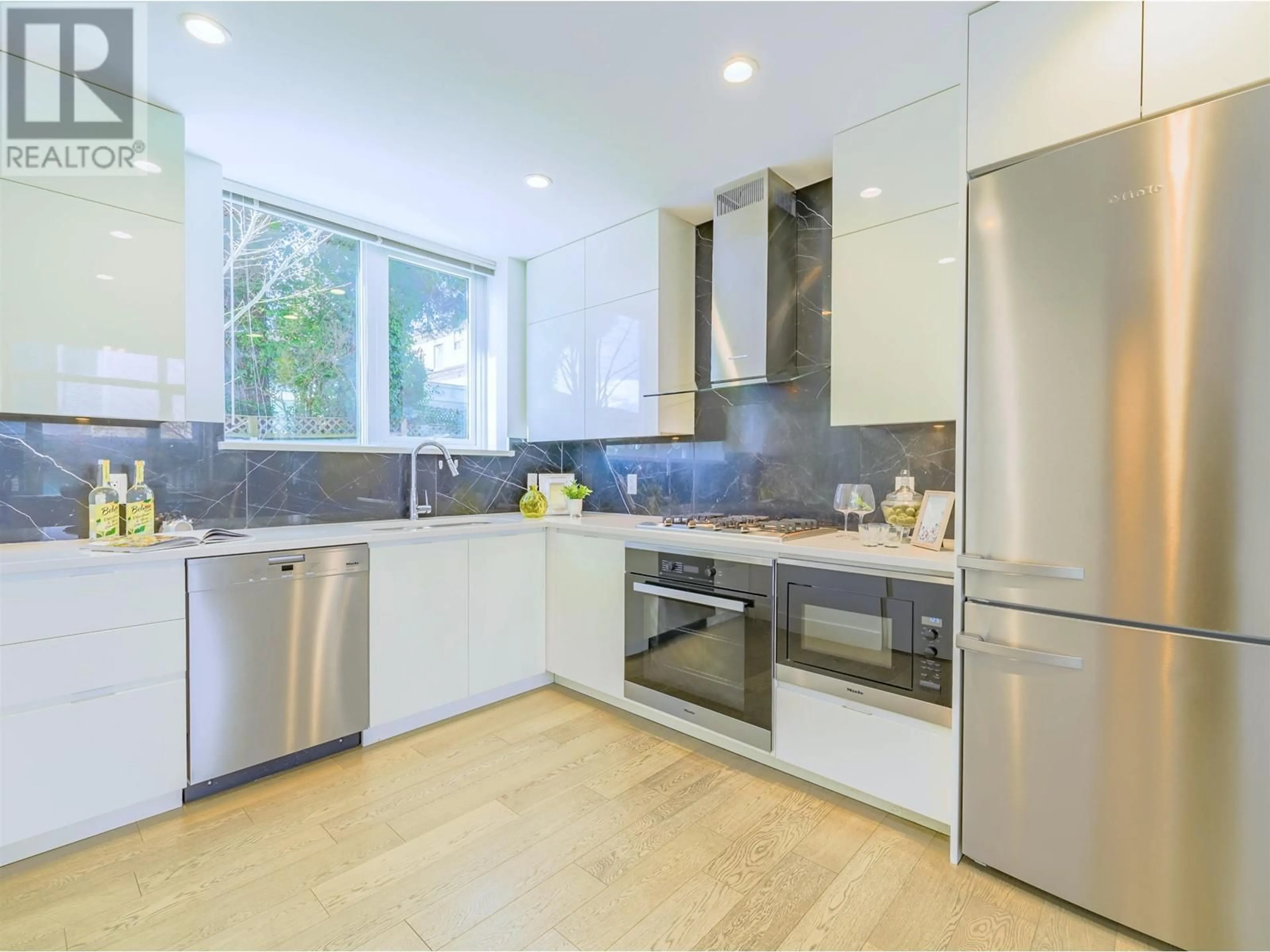 Contemporary kitchen, ceramic/tile floor for 6723 CAMBIE STREET, Vancouver British Columbia V6P3H1