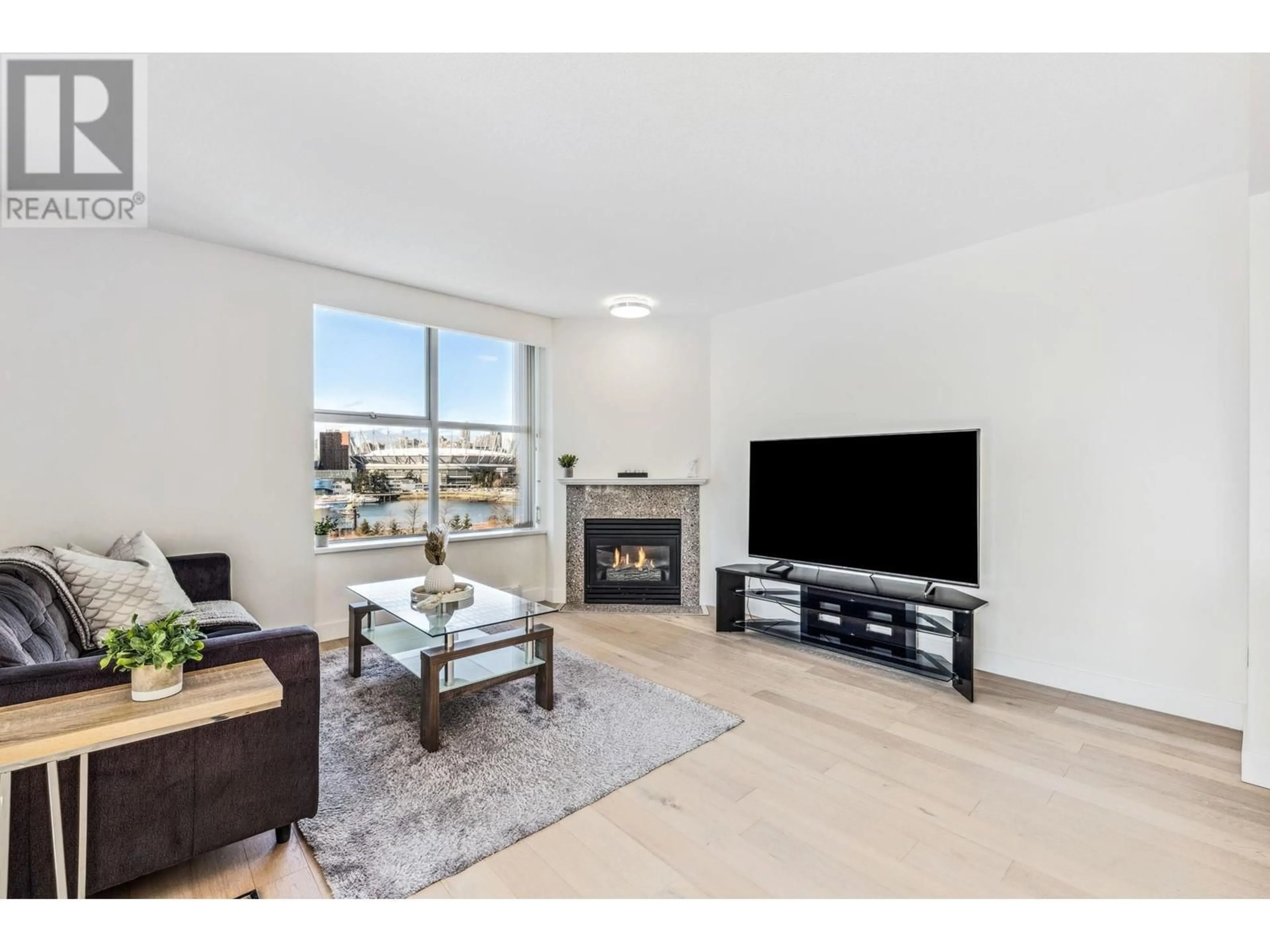 Living room with furniture, unknown for 805 - 1255 MAIN STREET, Vancouver British Columbia V6A4G5