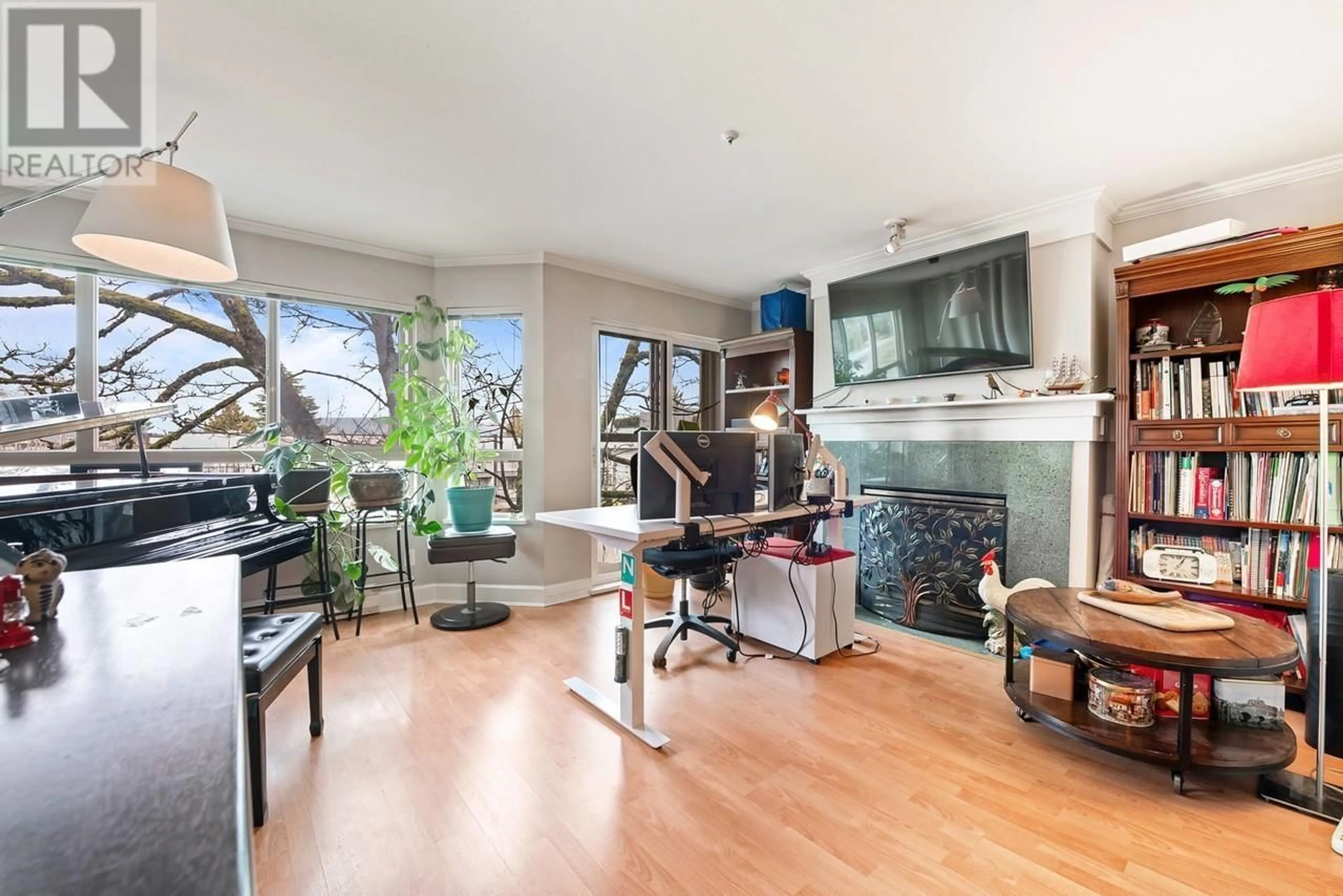 Dining room, wood/laminate floor for 201 - 3615 17TH AVENUE, Vancouver British Columbia V6S1A3