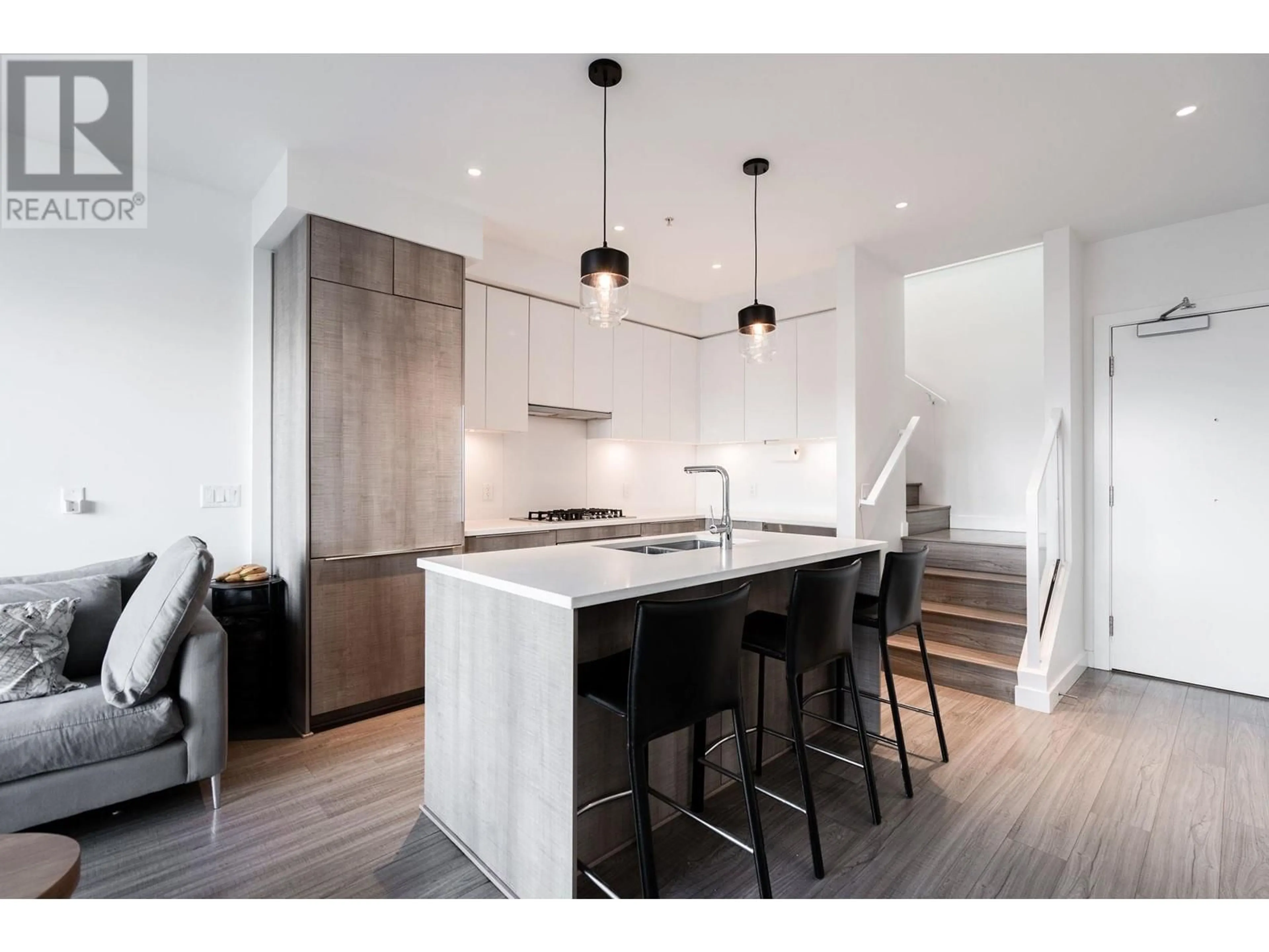 Contemporary kitchen, wood/laminate floor for 504 379 E BROADWAY, Vancouver British Columbia V5T1W6