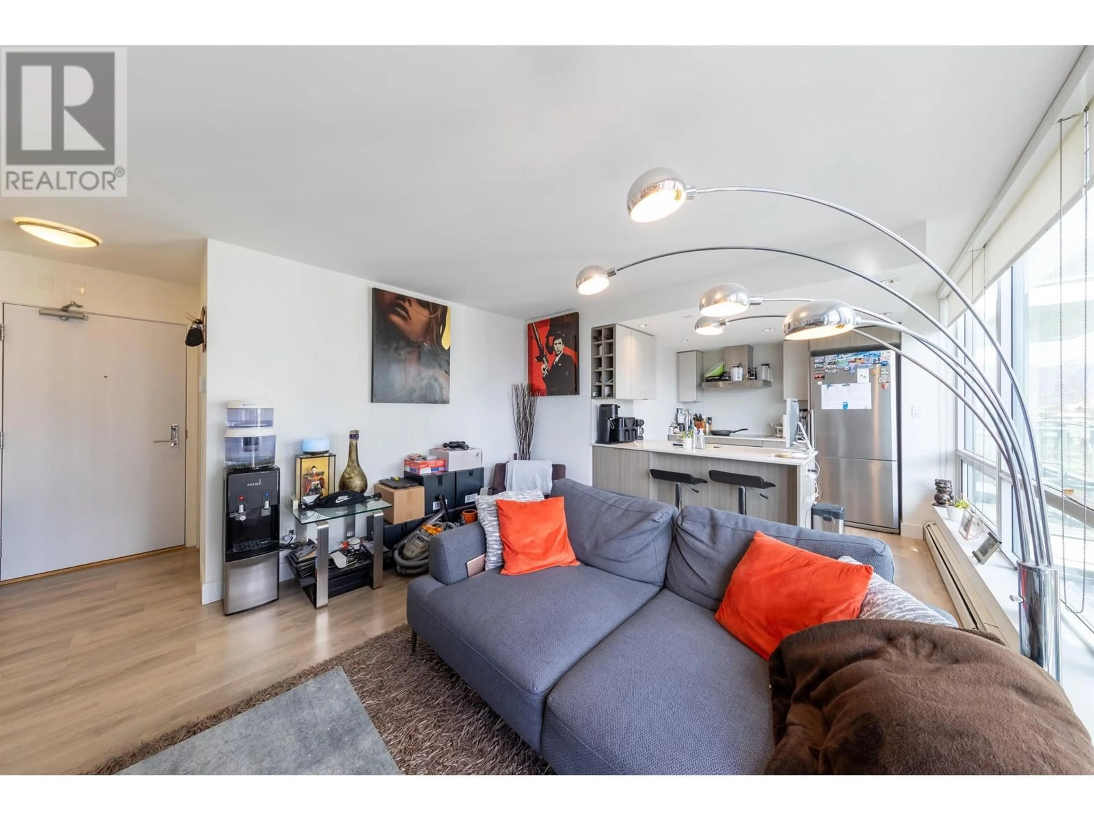 Living room with furniture, wood/laminate floor for 1005 - 1788 COLUMBIA STREET, Vancouver British Columbia V5Y0L7