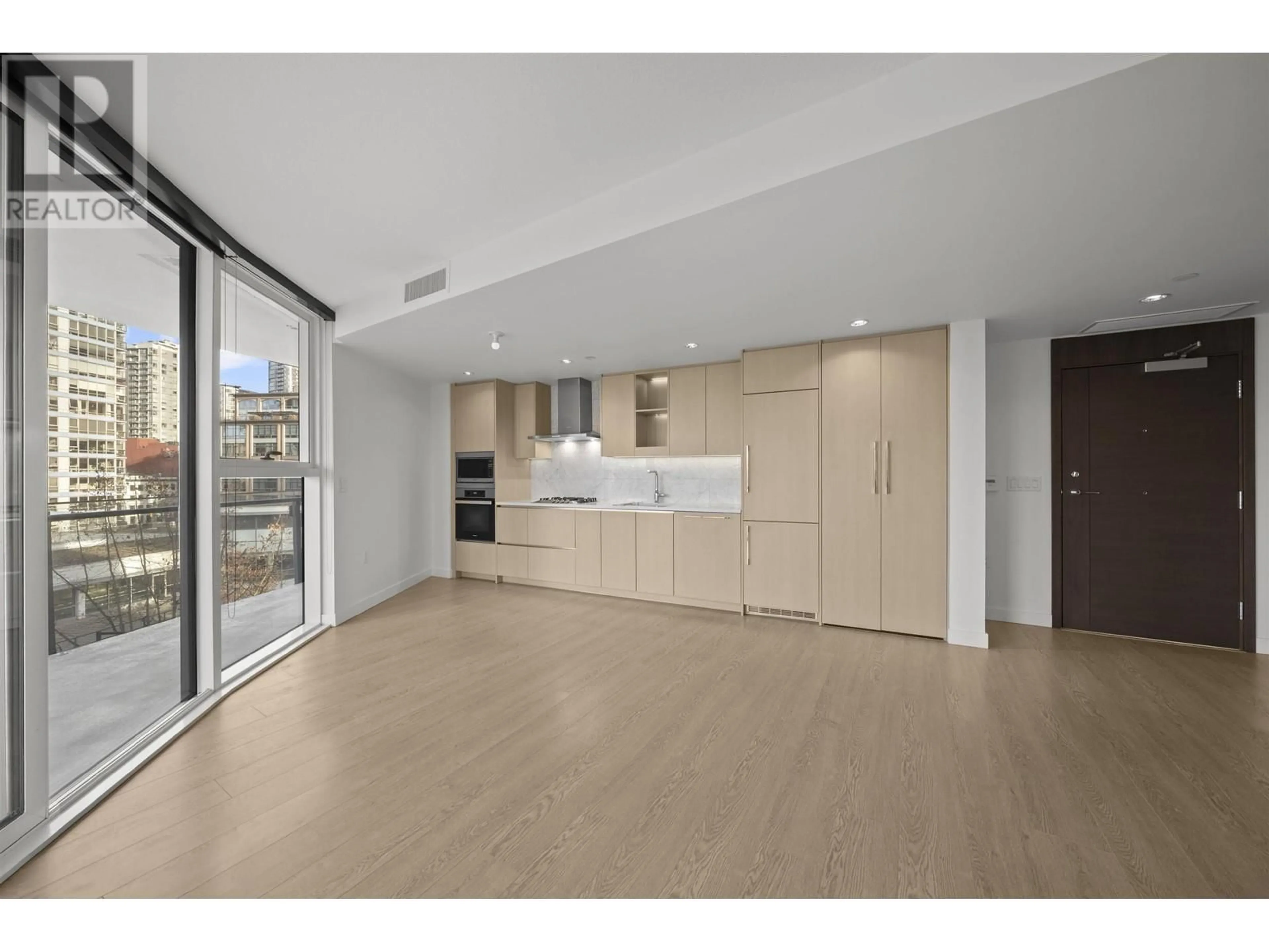 Open concept kitchen, unknown for 605 - 89 NELSON STREET, Vancouver British Columbia V6Z0E7