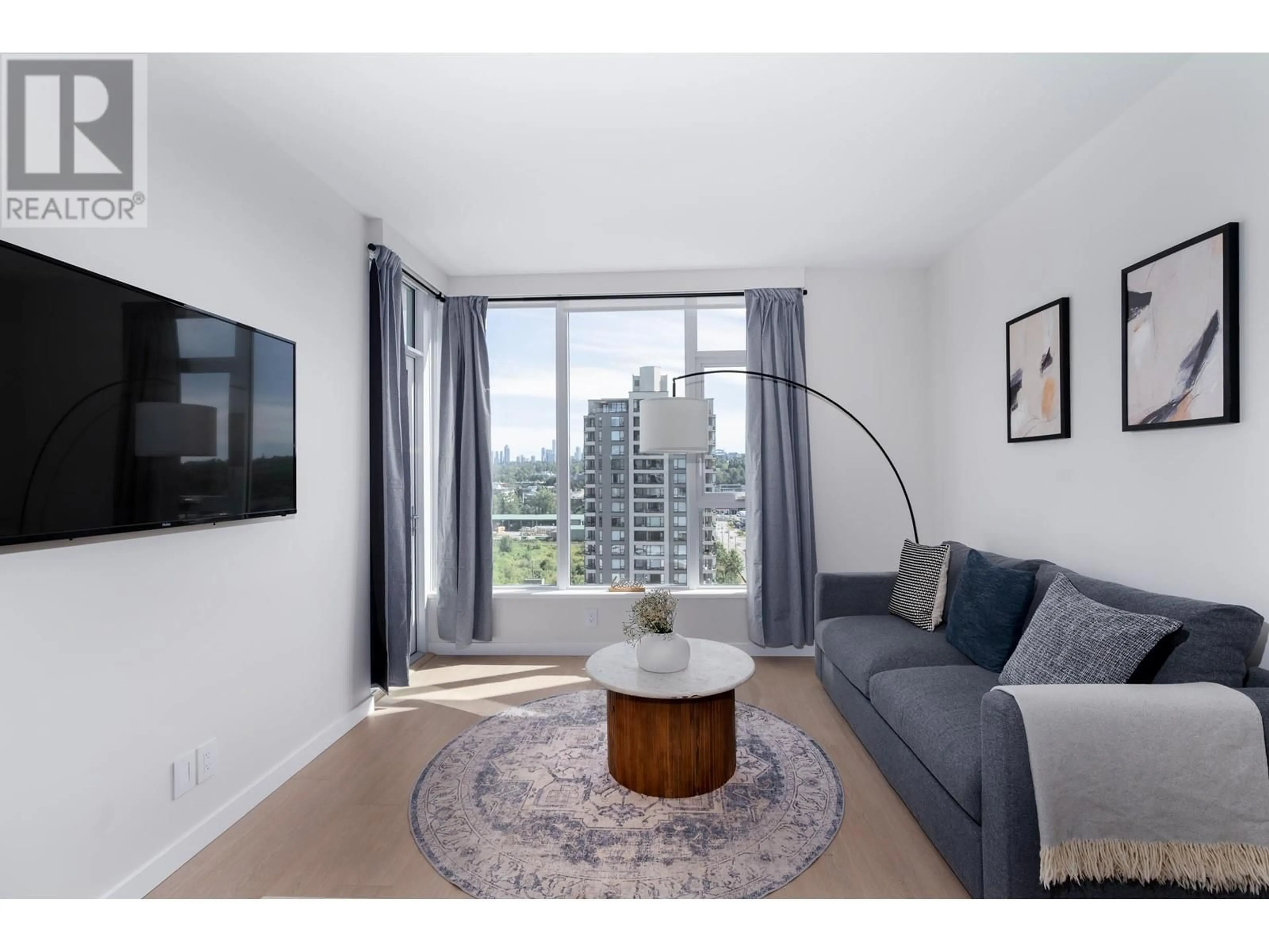 Living room with furniture, wood/laminate floor for 1112 - 2186 GILMORE AVENUE, Burnaby British Columbia V5C0N7