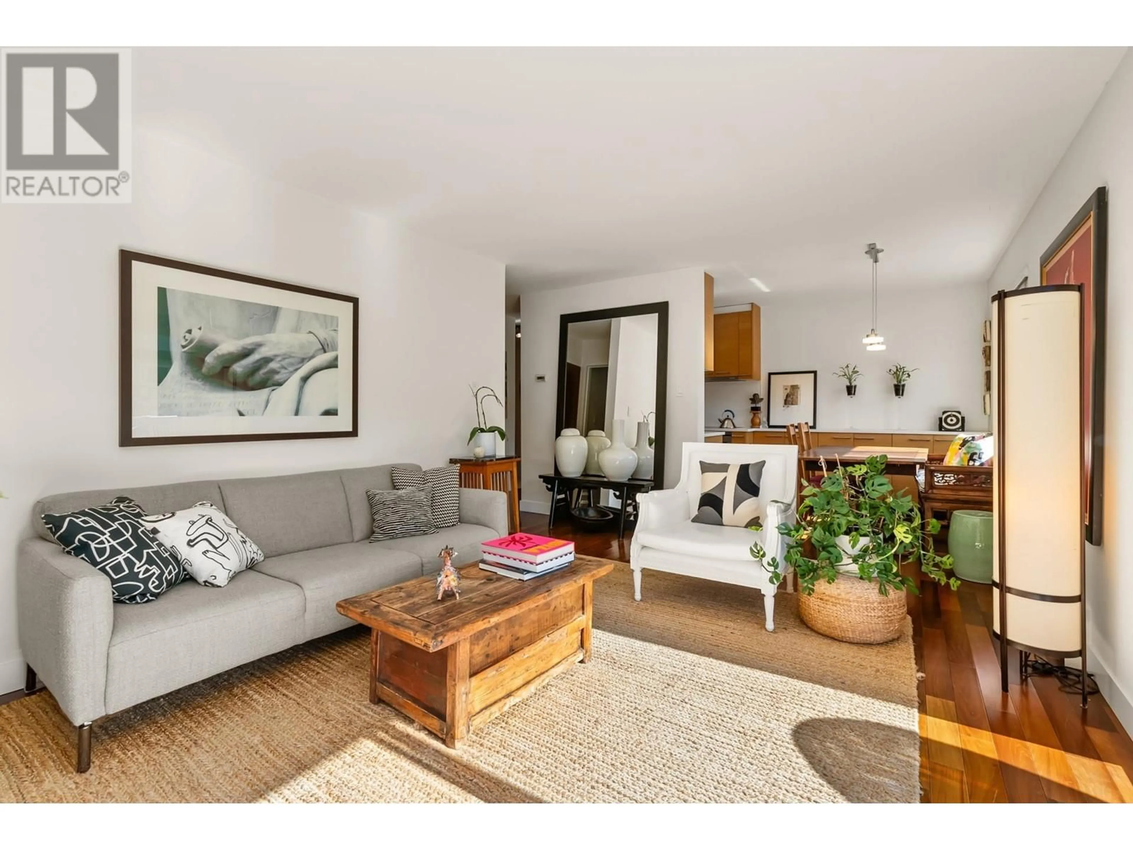 Living room with furniture, wood/laminate floor for 303 2335 YORK AVENUE, Vancouver British Columbia V6K1C8