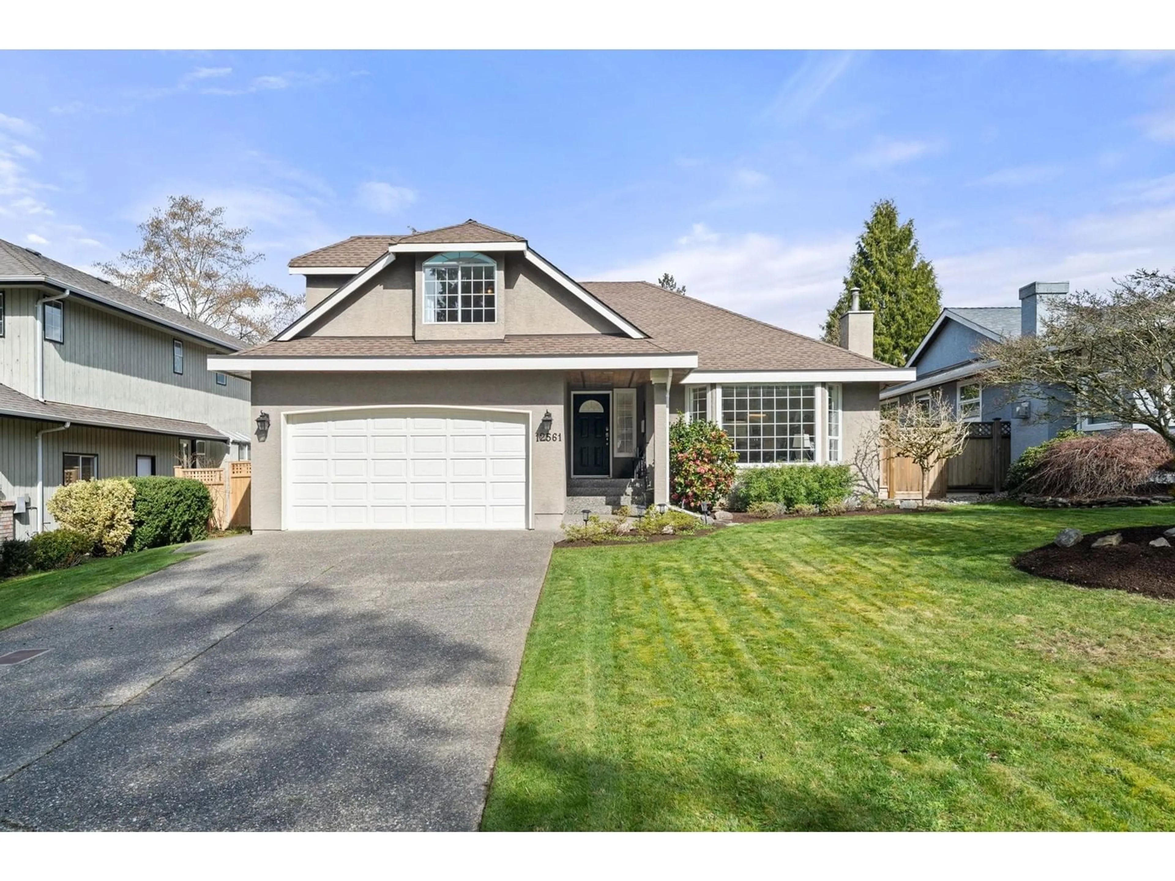 Home with vinyl exterior material, street for 12561 18, Surrey British Columbia V4A1V8