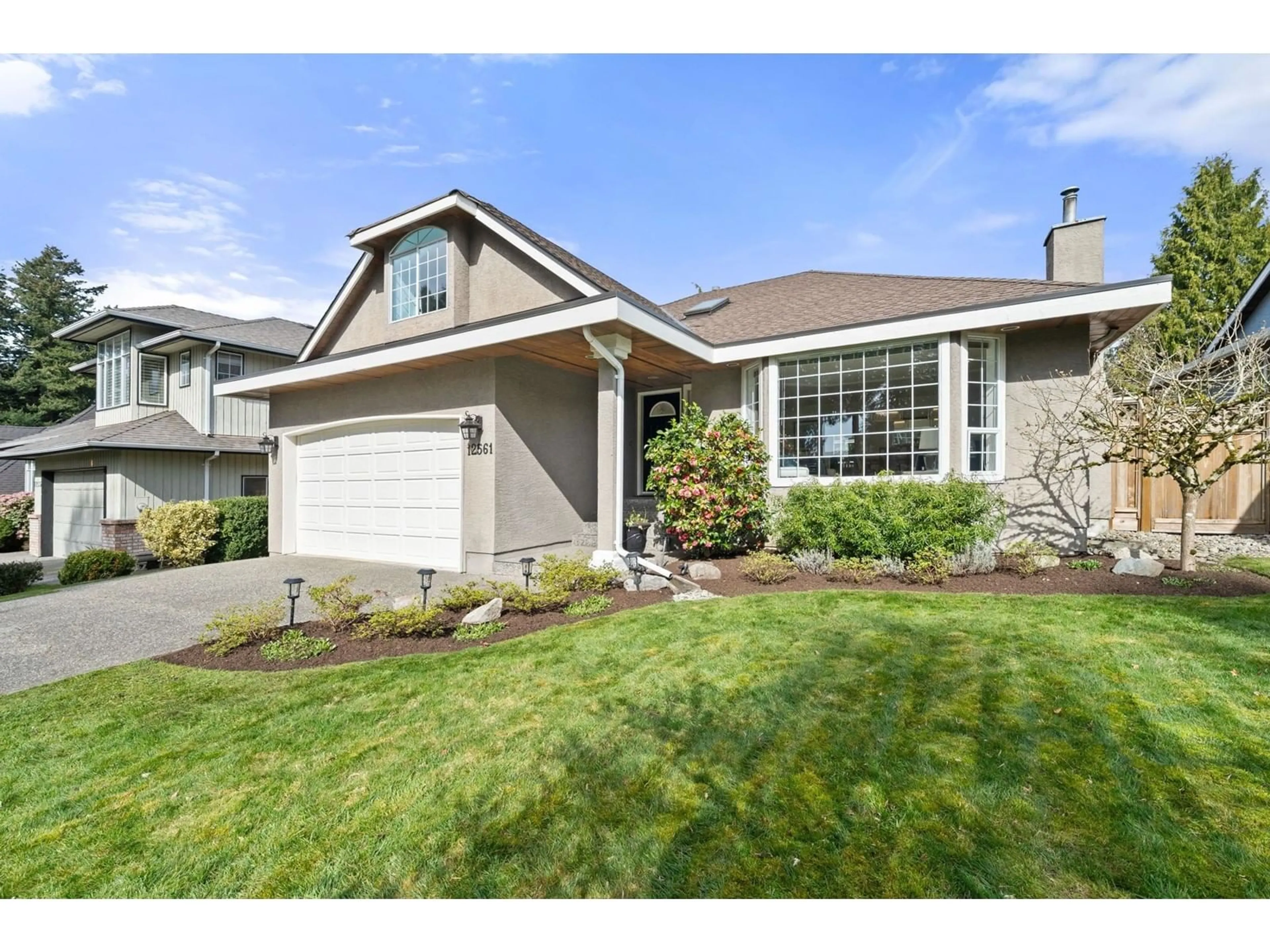 Home with vinyl exterior material, street for 12561 18, Surrey British Columbia V4A1V8